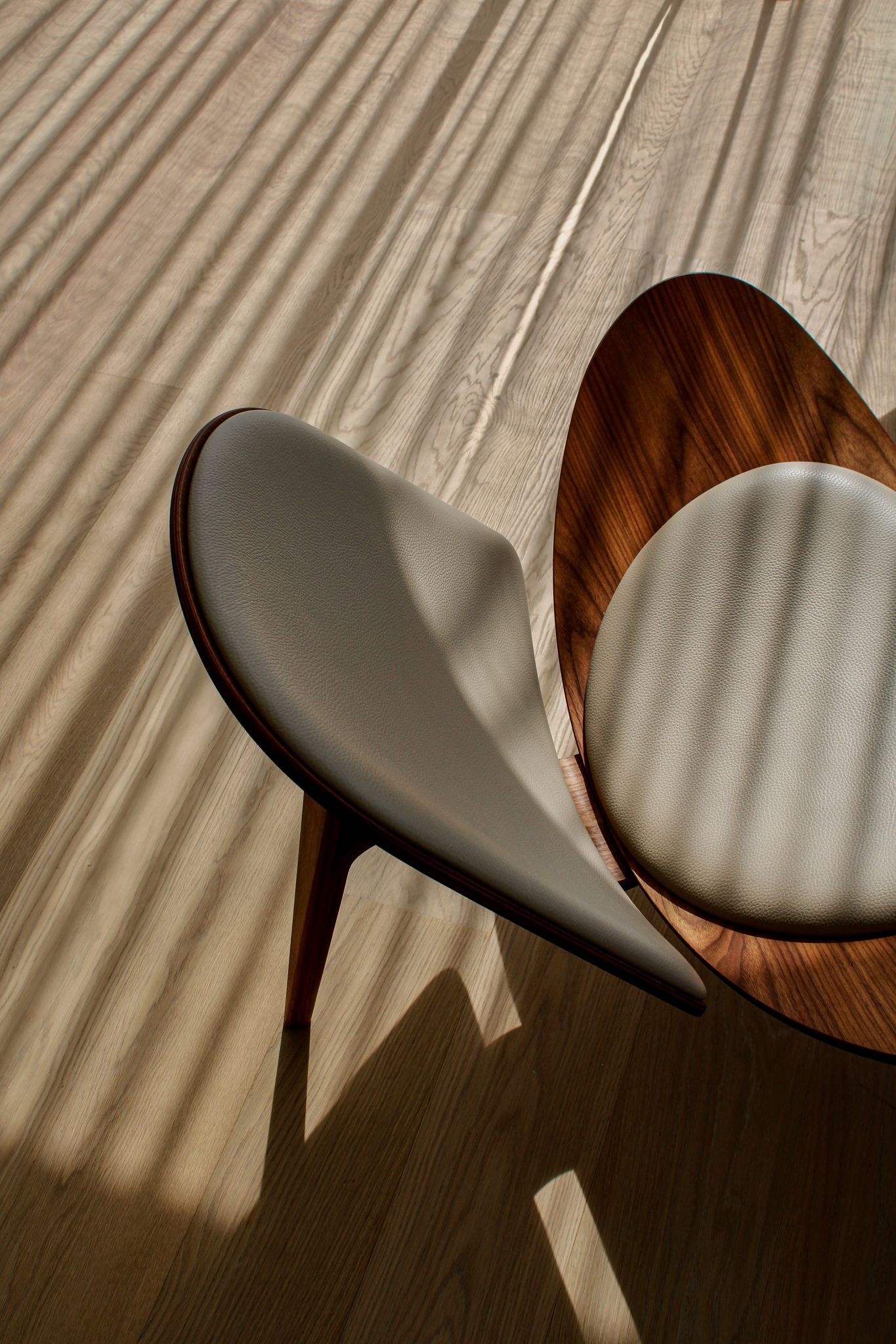 Contemporary lounge chair in the lobby of Paxton MLV Hotel illuminated by soft evening light
