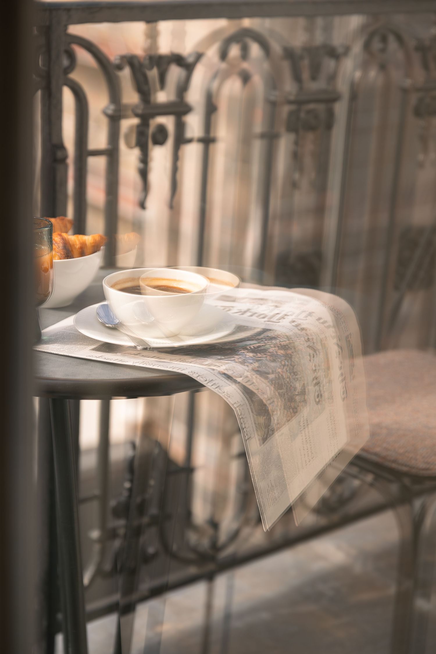 Breakfast served on the private balcony of a suite at Hôtel Padam in Paris