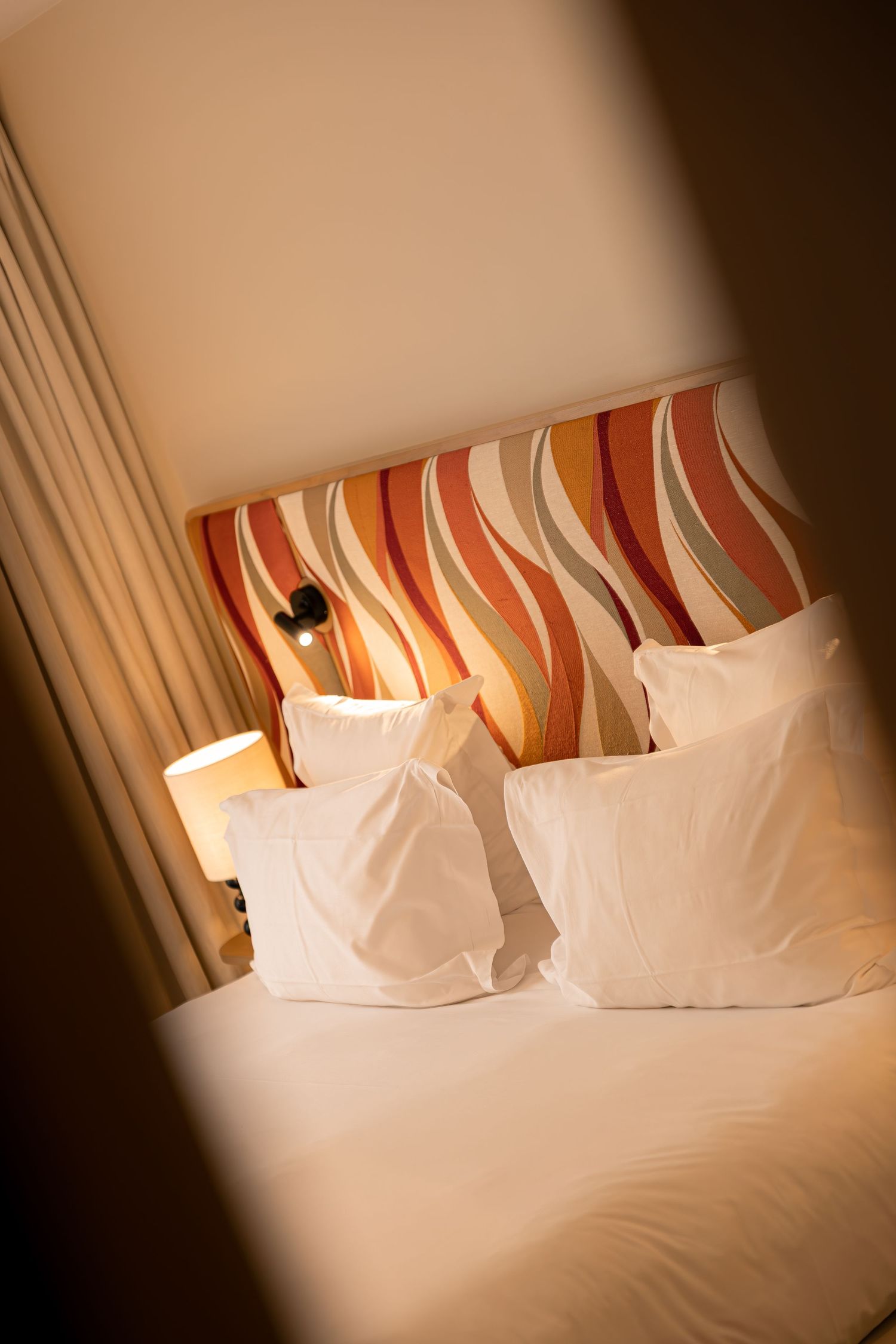 Elegant suite with a king-size bed at Hôtel Padam in Paris