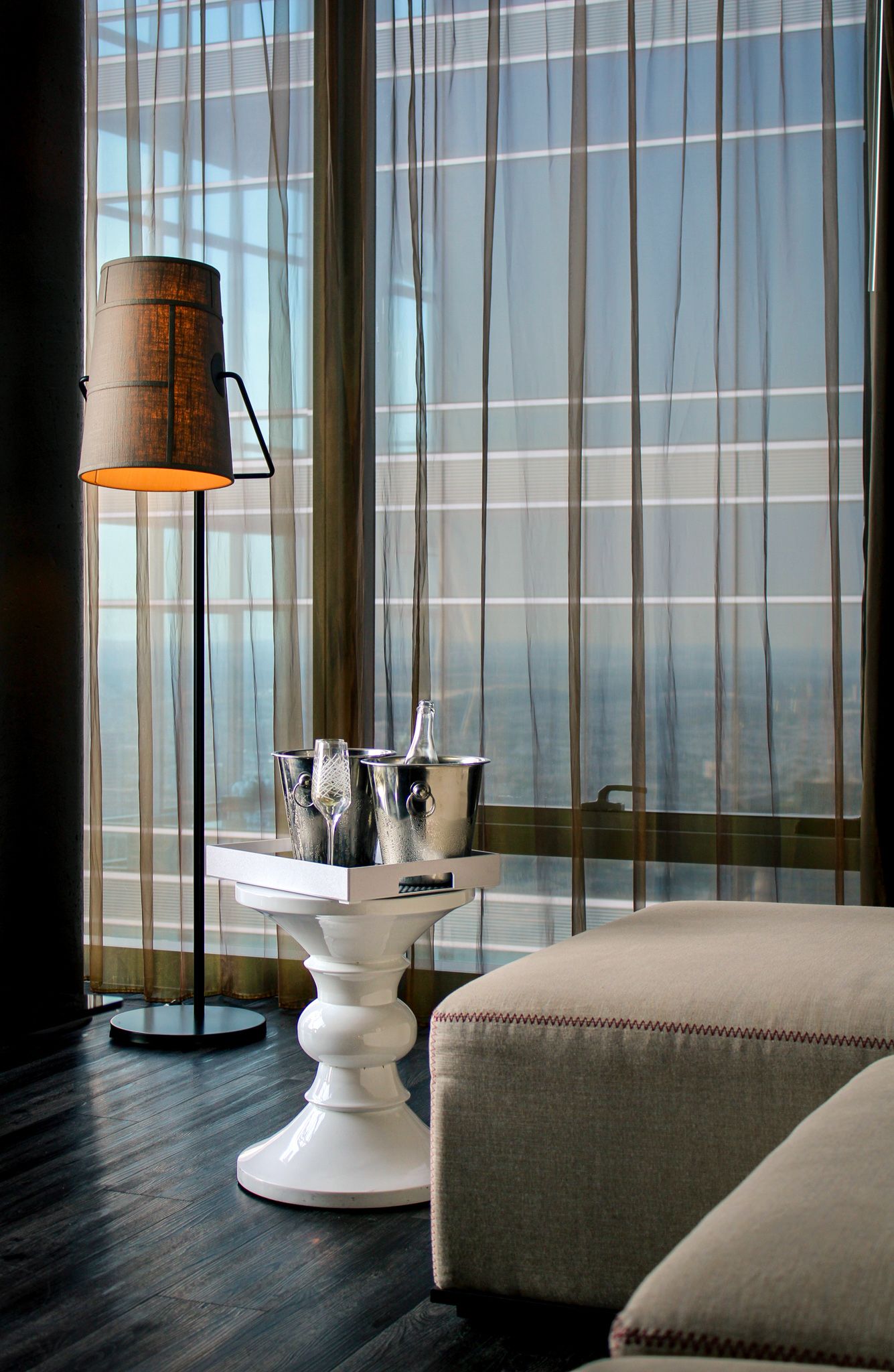Luxury suite lounge with champagne and panoramic views over Philadelphia at W Philadelphia