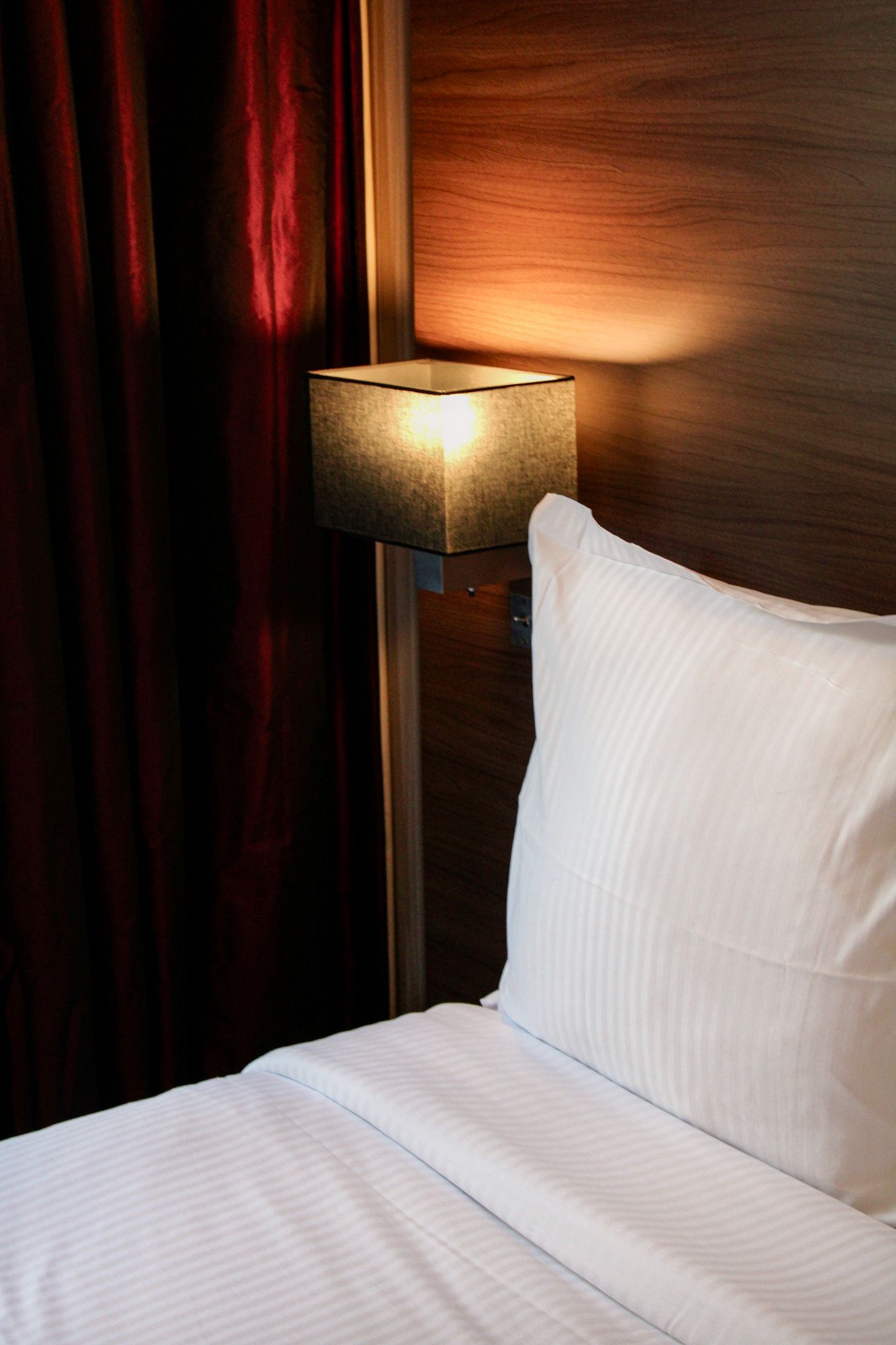 Elegant guest room at Paxton MLV Hotel with a king-size bed and contemporary interior design