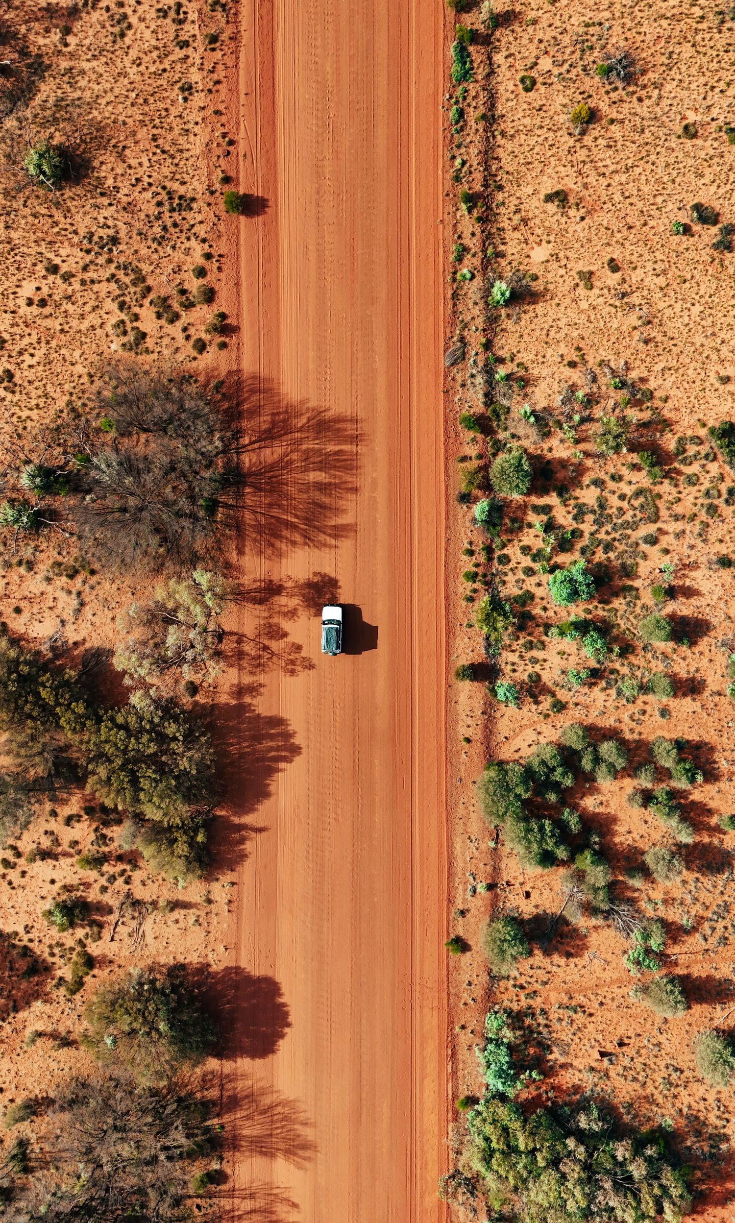 Aerial drone view of a travel destination, dramatic landscape, natural colors, cinematic composition capturing the beauty of the world.