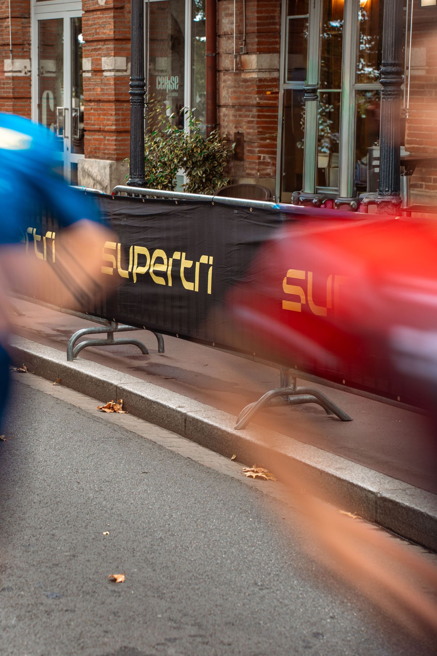Triathlon competition photography capturing endurance athletes in motion, strength, focus and intense sporting atmosphere.