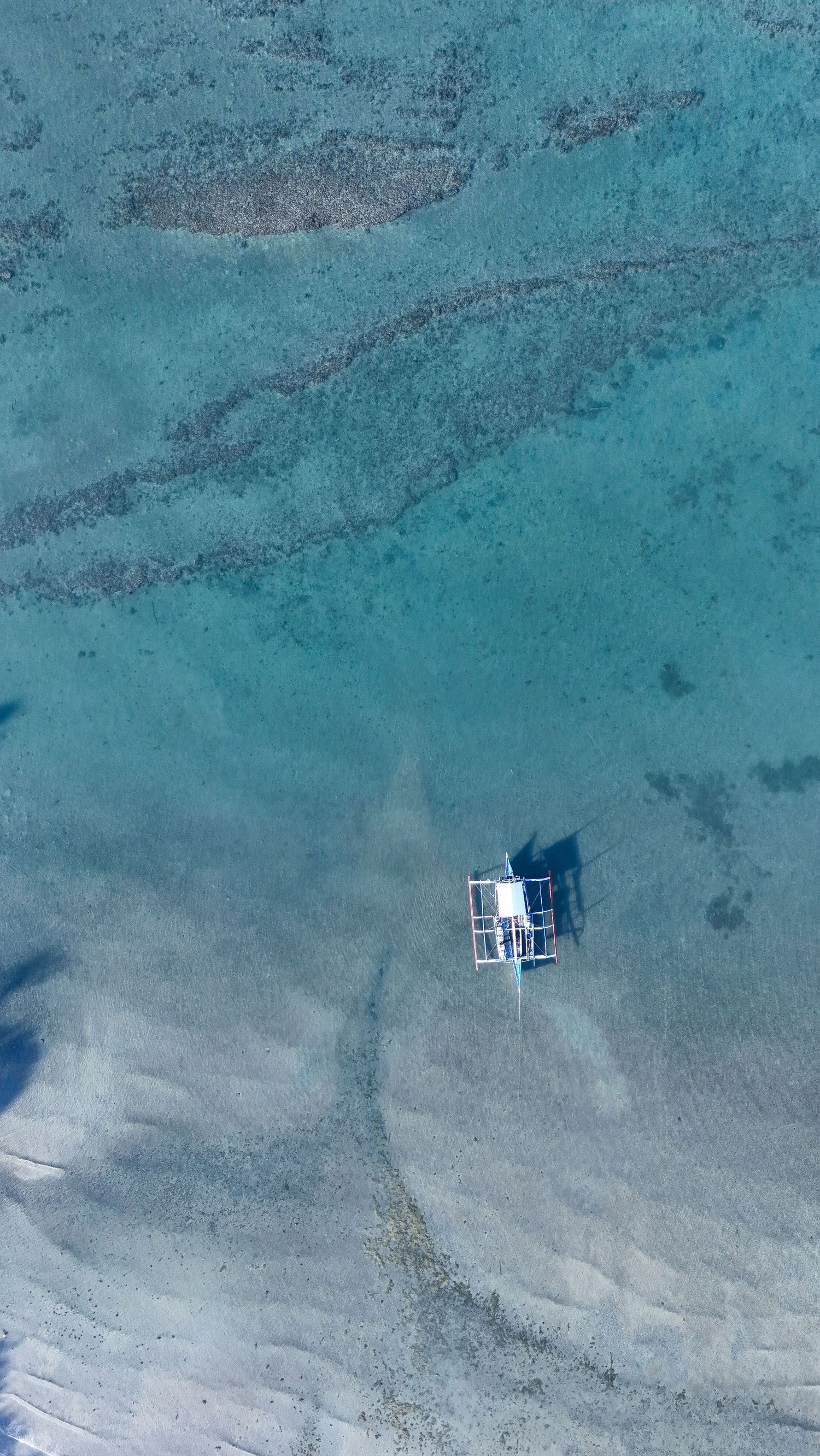 Aerial drone view of a travel destination, dramatic landscape, natural colors, cinematic composition capturing the beauty of the world.