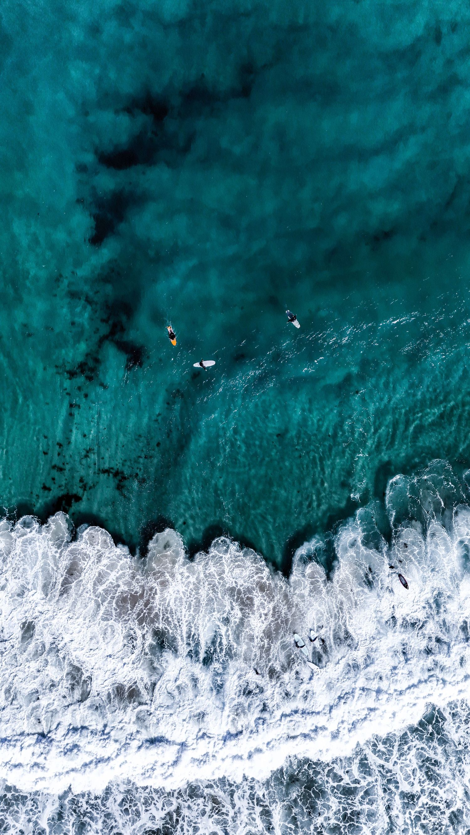 Aerial drone view of a travel destination, dramatic landscape, natural colors, cinematic composition capturing the beauty of the world.