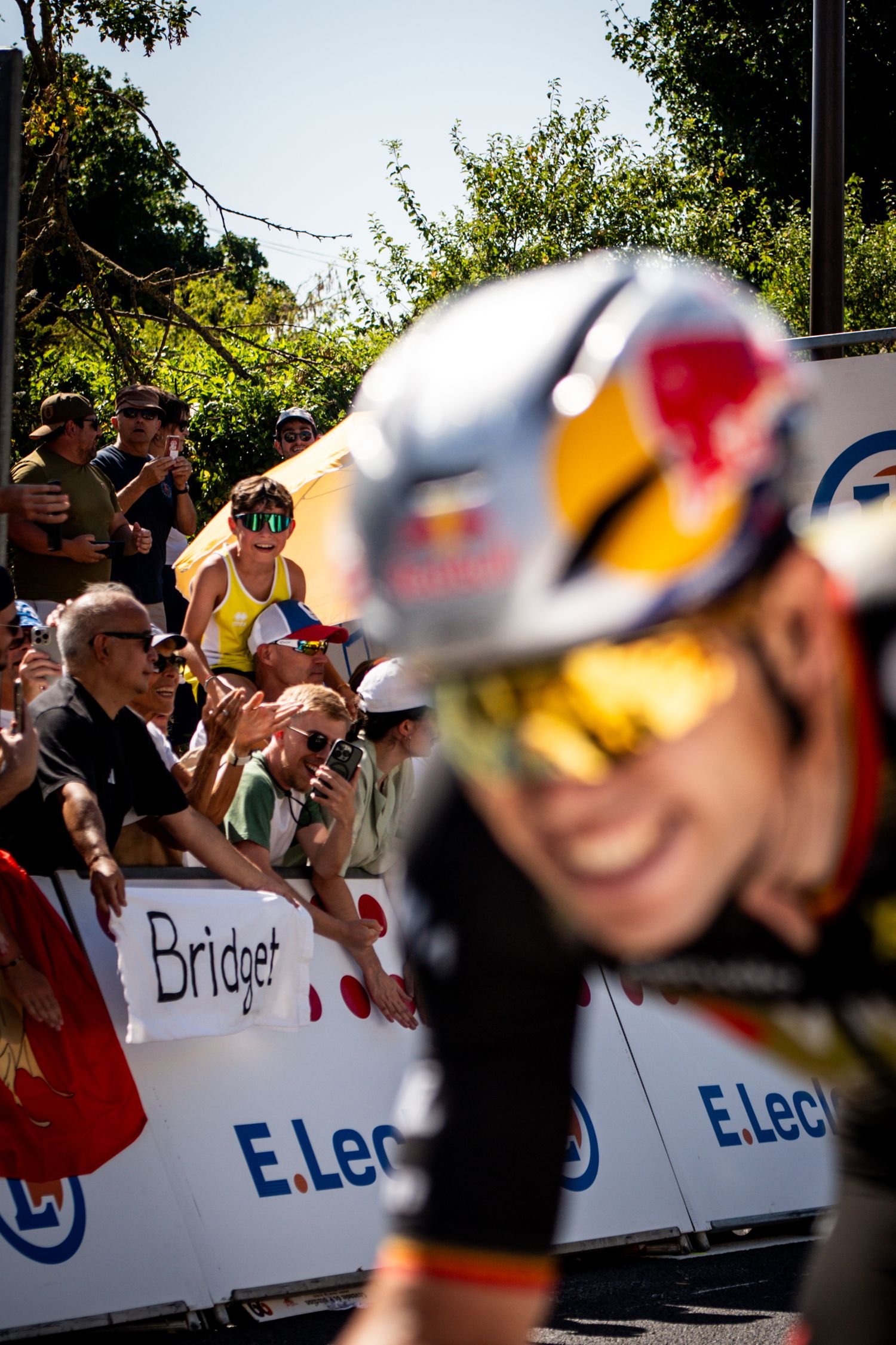Action photography of cyclists during the Tour de France, motion, energy and determination in a dynamic sports atmosphere.