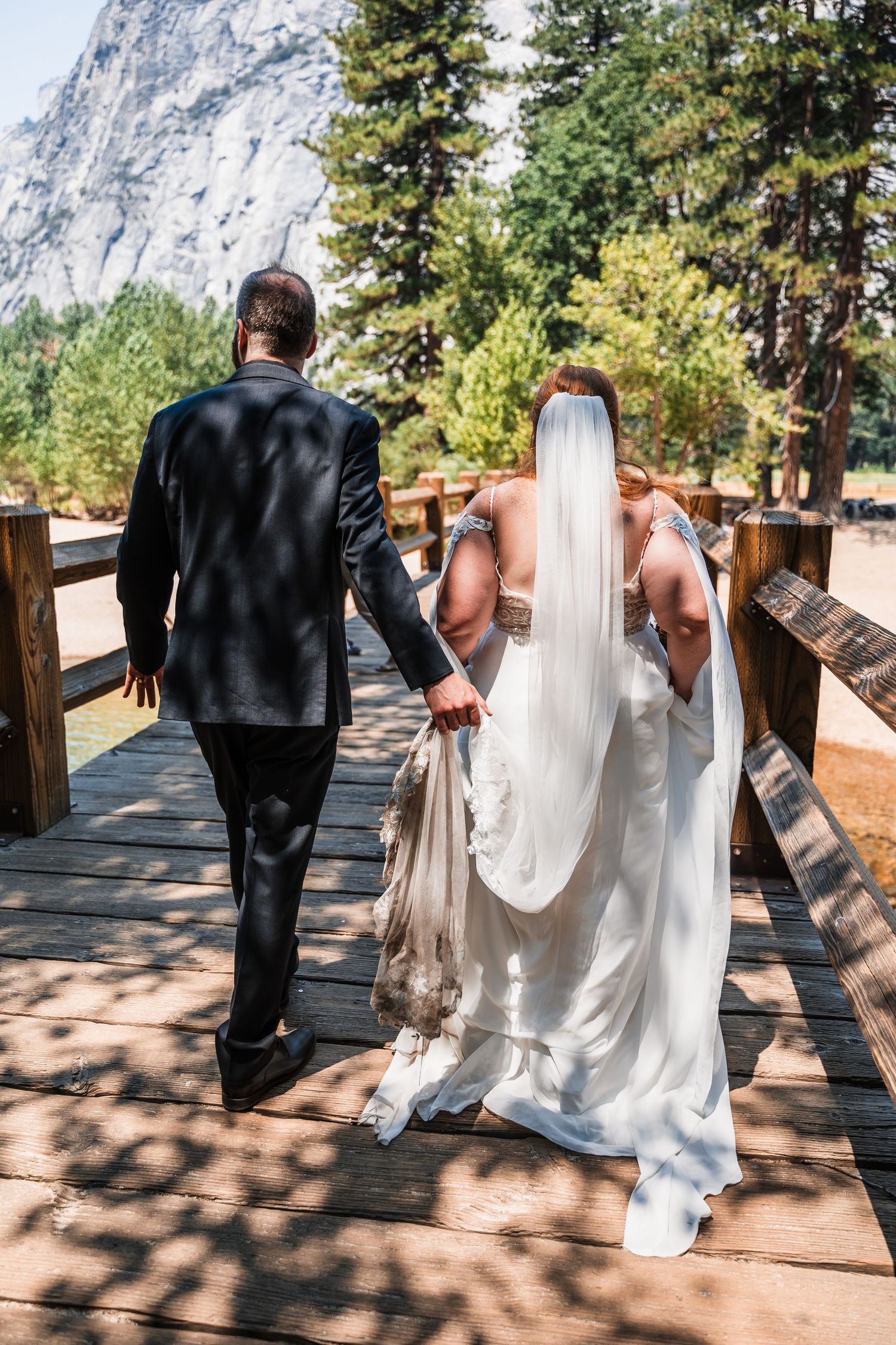 A series of photos showing a couple walking along a mountain path with Half Dome in Yosemite as backdrop.
