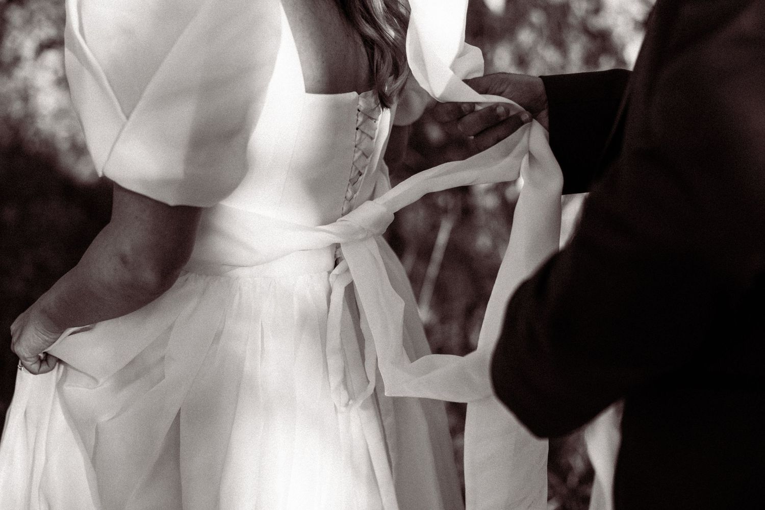 Black and white candid shots capturing intimate wedding ceremony moments.