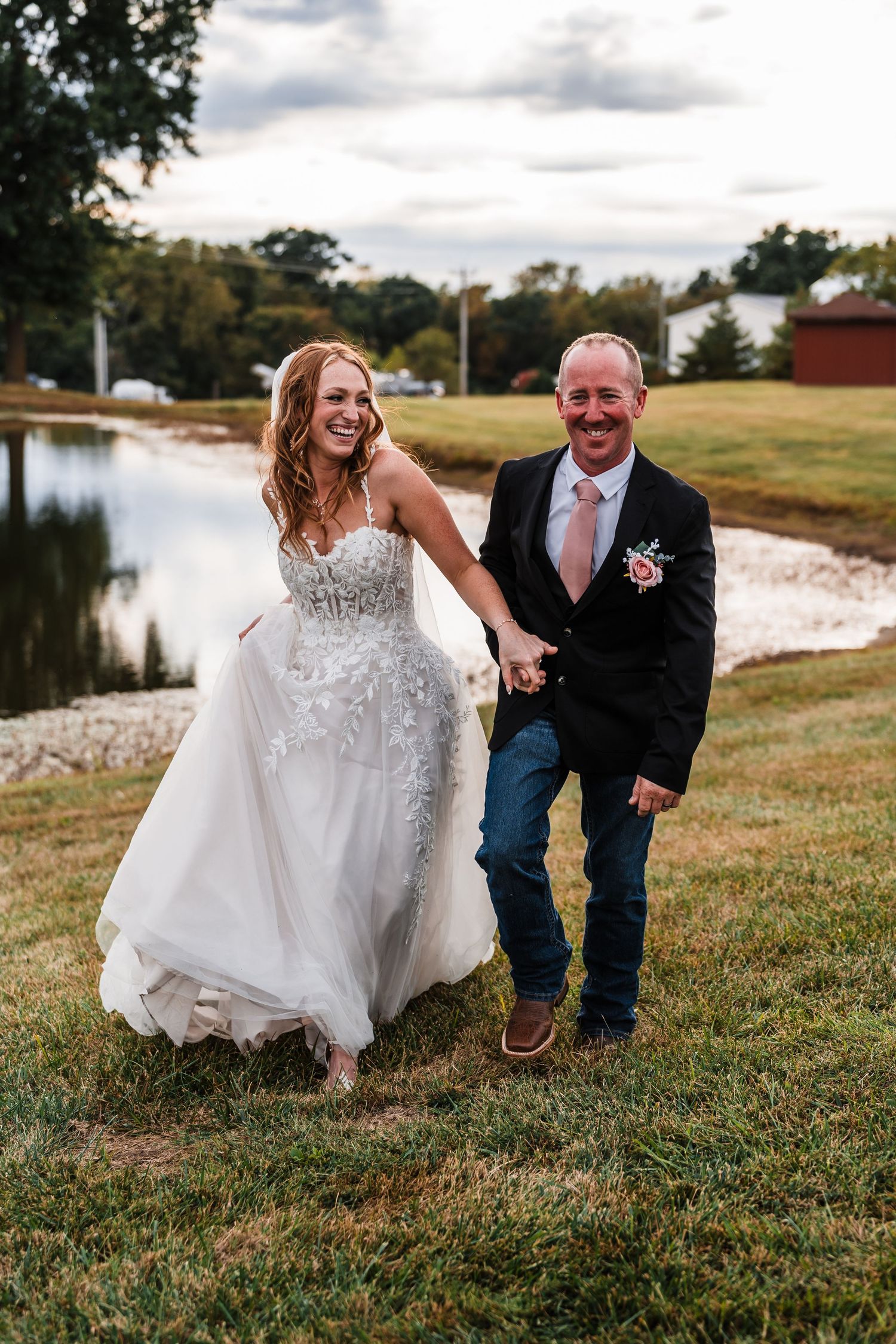 Joyful moments captured on grassy hillside during wedding celebration.