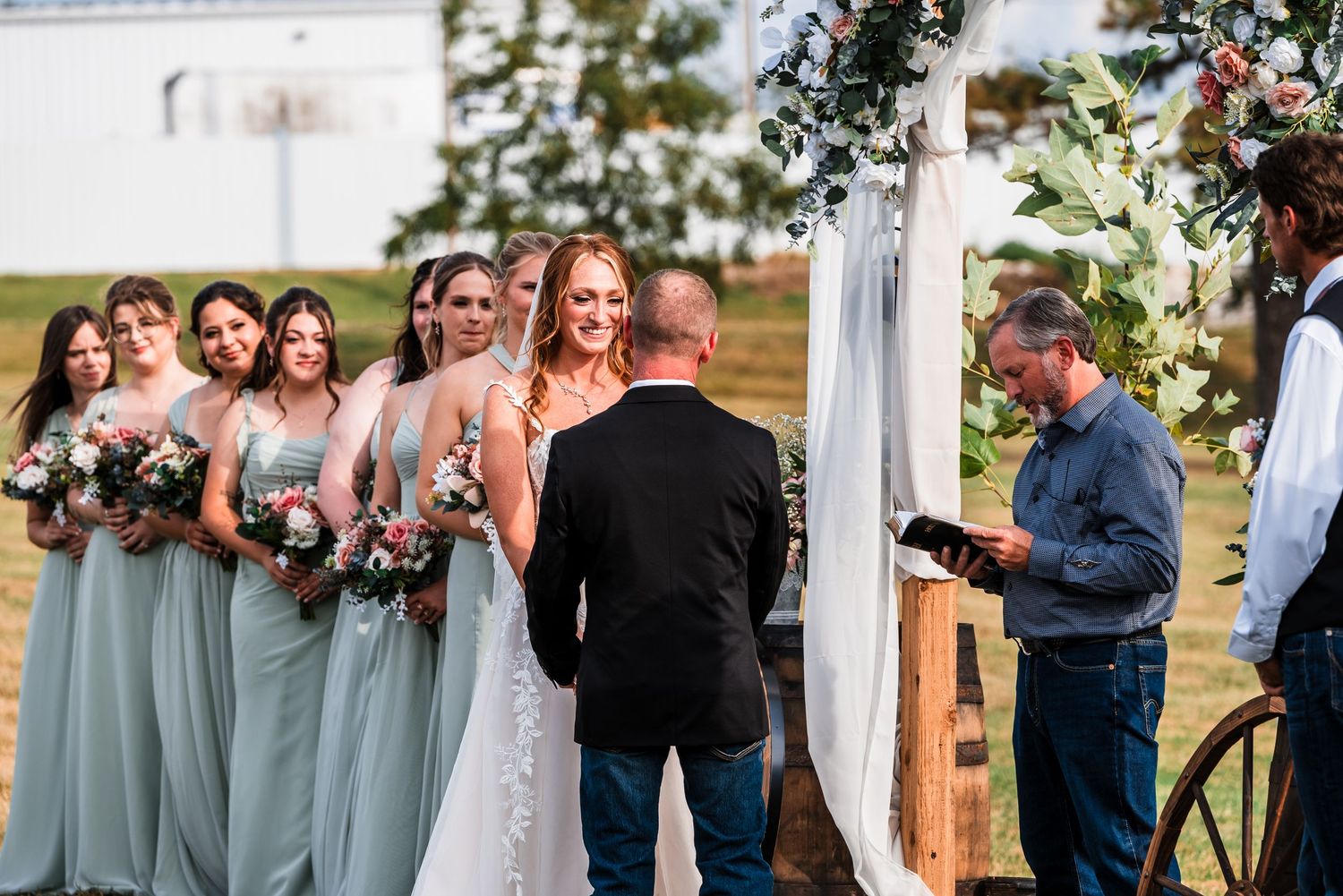 Wedding party photos showing bridesmaids in sage green dresses gathered outdoors.