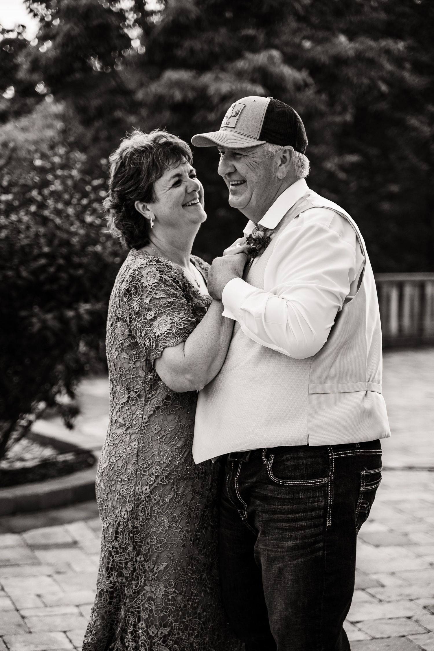 Black and white photos capturing intimate dance moments at a wedding reception.
