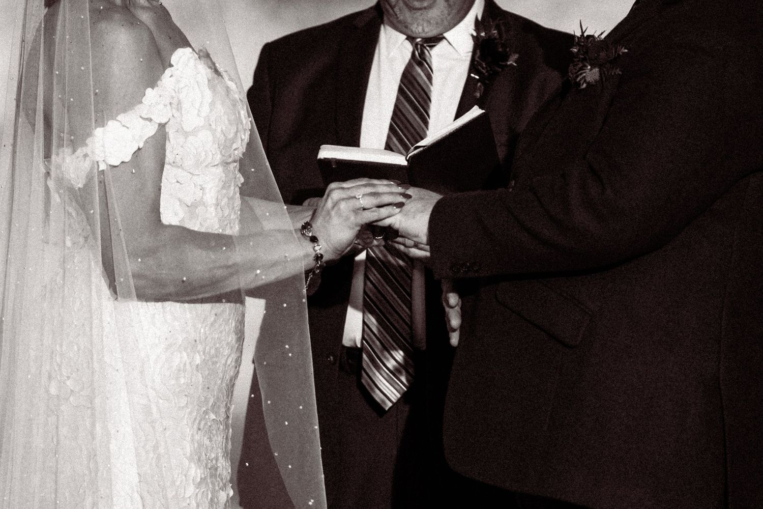 Formal wedding ceremony moments captured in black and white.