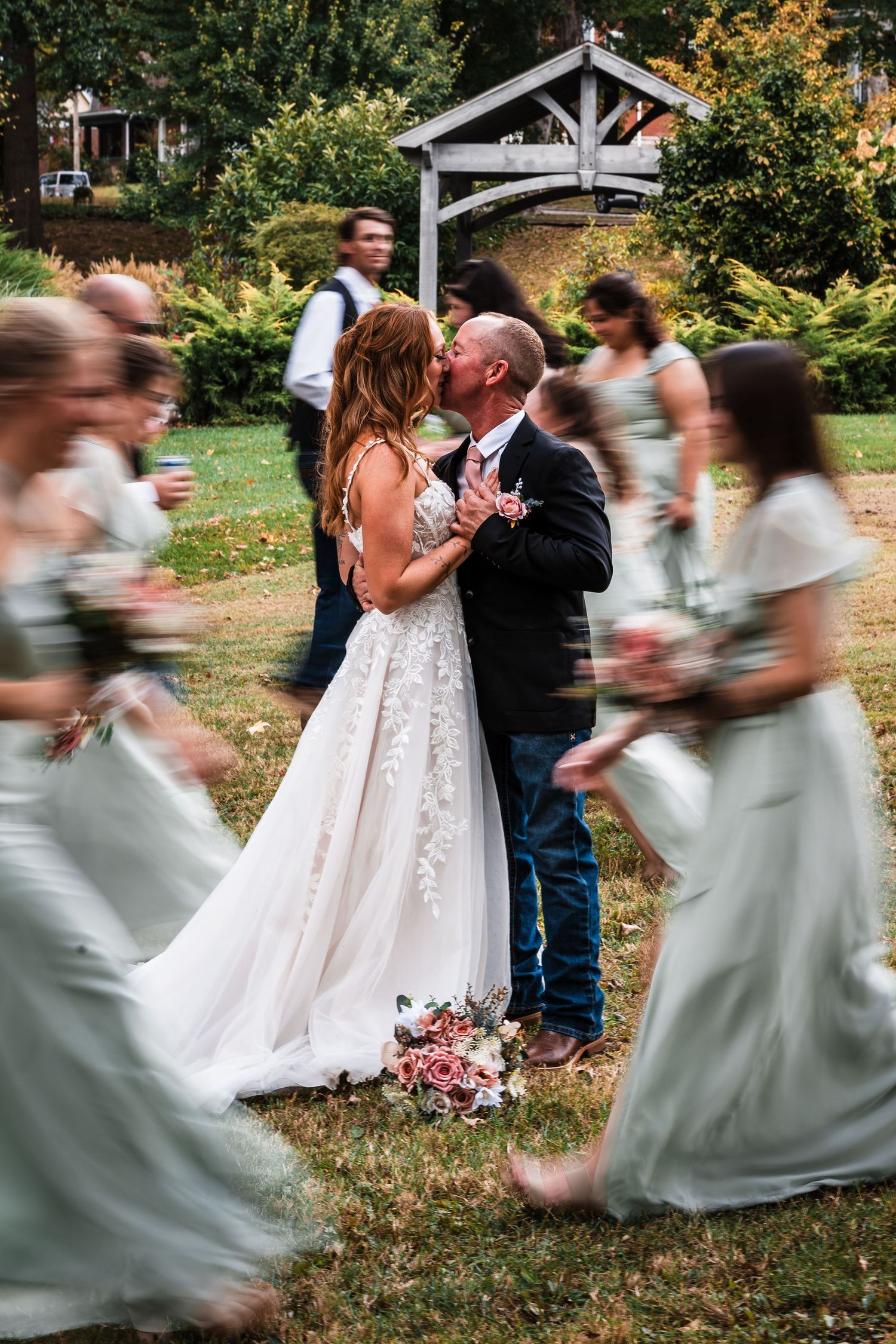 Creative wedding photo sequence showing couple kissing while bridesmaids run past in a garden setting.