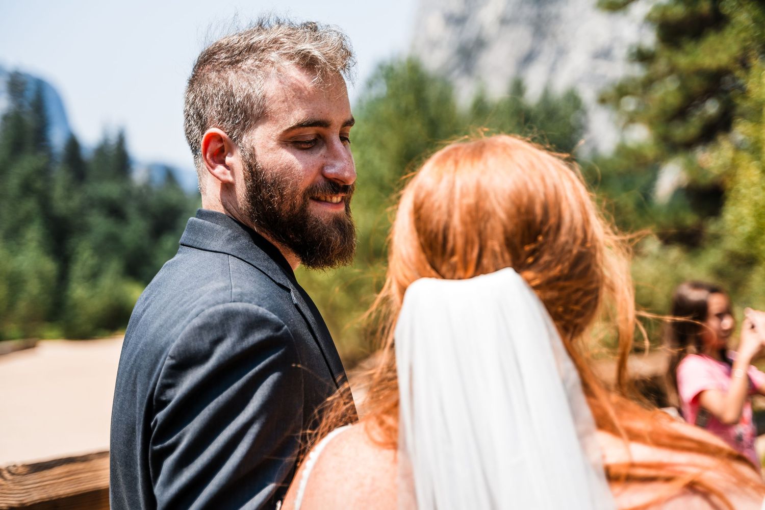 Candid wedding moments captured in sequence with natural mountain scenery.