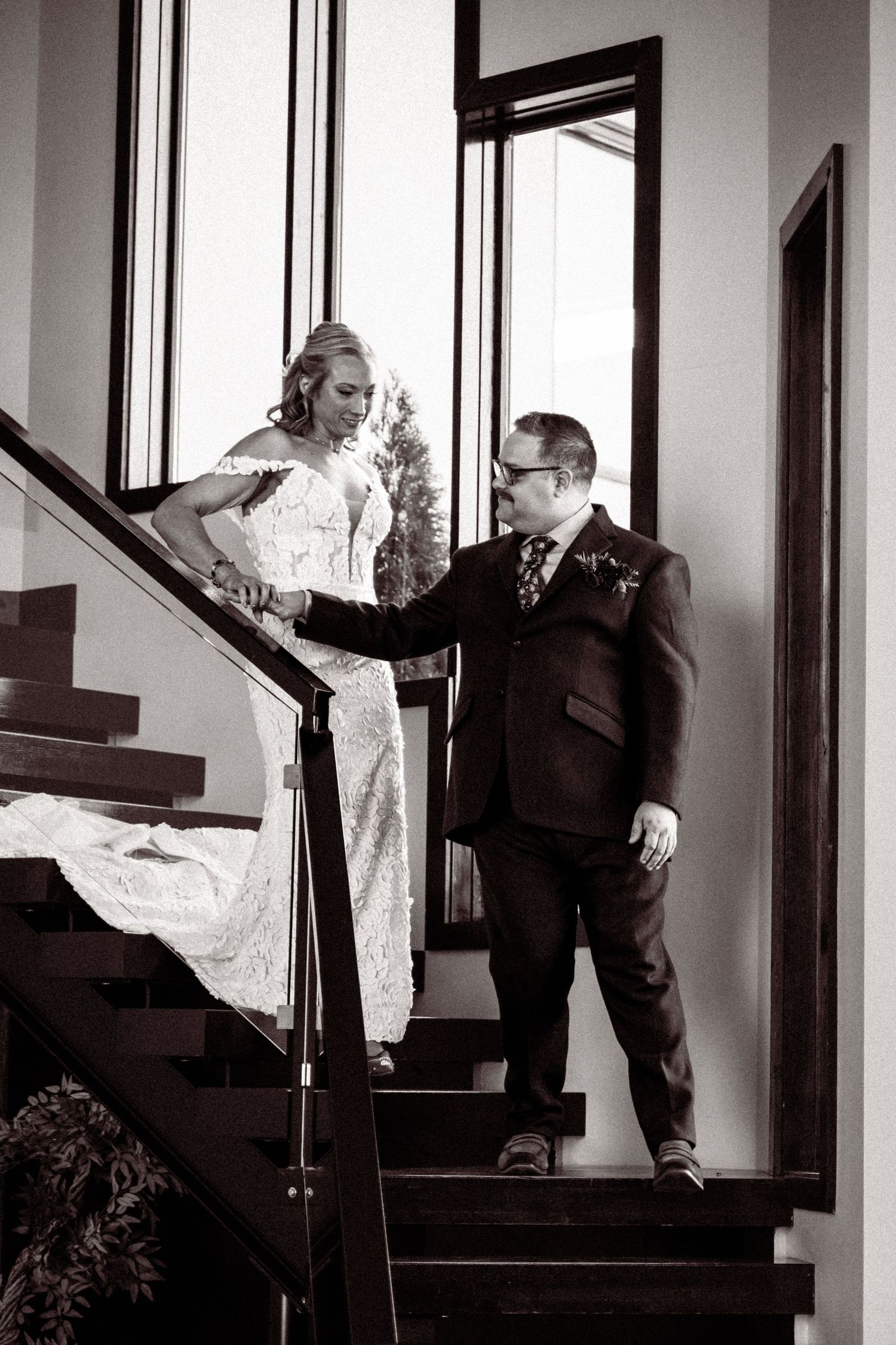 A dramatic black and white photo sequence showing playful moments on a staircase.