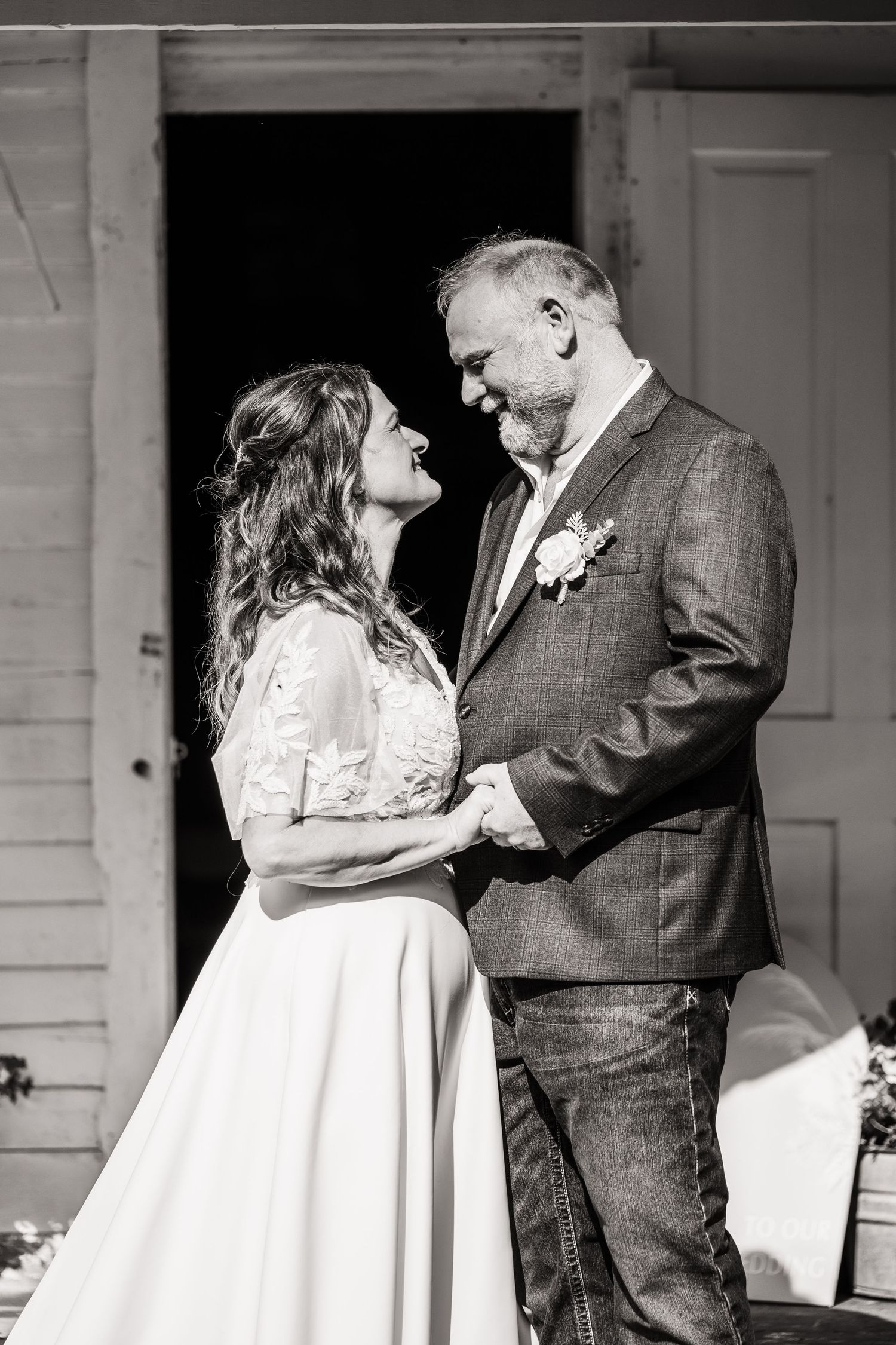 Black and white photos showing couple's tender moments during first dance at wedding.