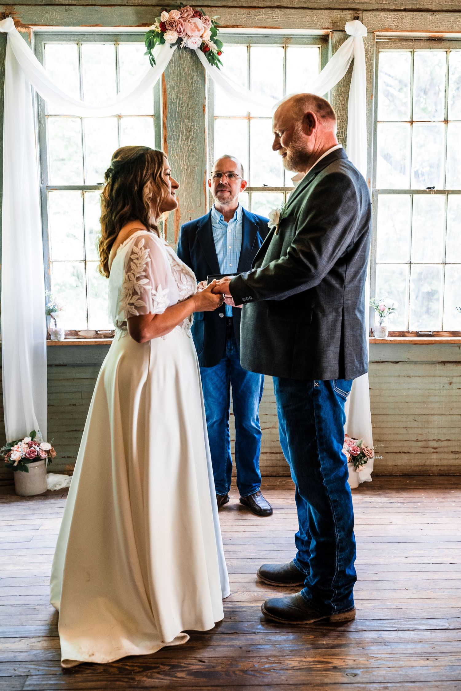 Series of wedding ceremony photographs in a rustic venue with natural light streaming through windows.