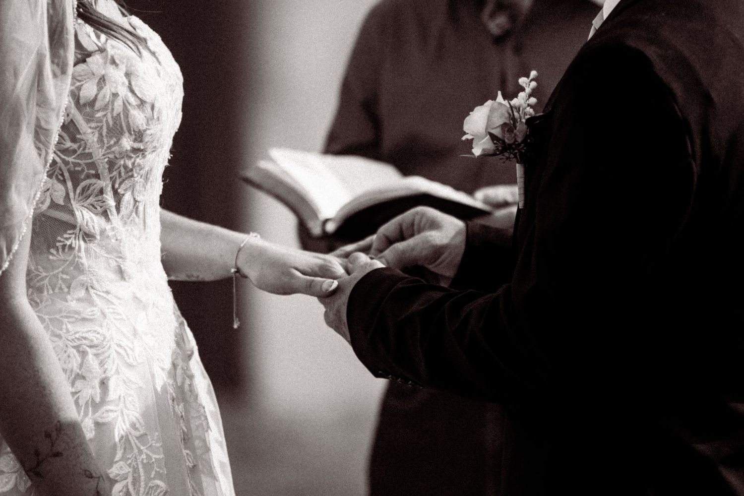 Bride and groom share an intimate moment during their first dance at an elegant wedding reception.