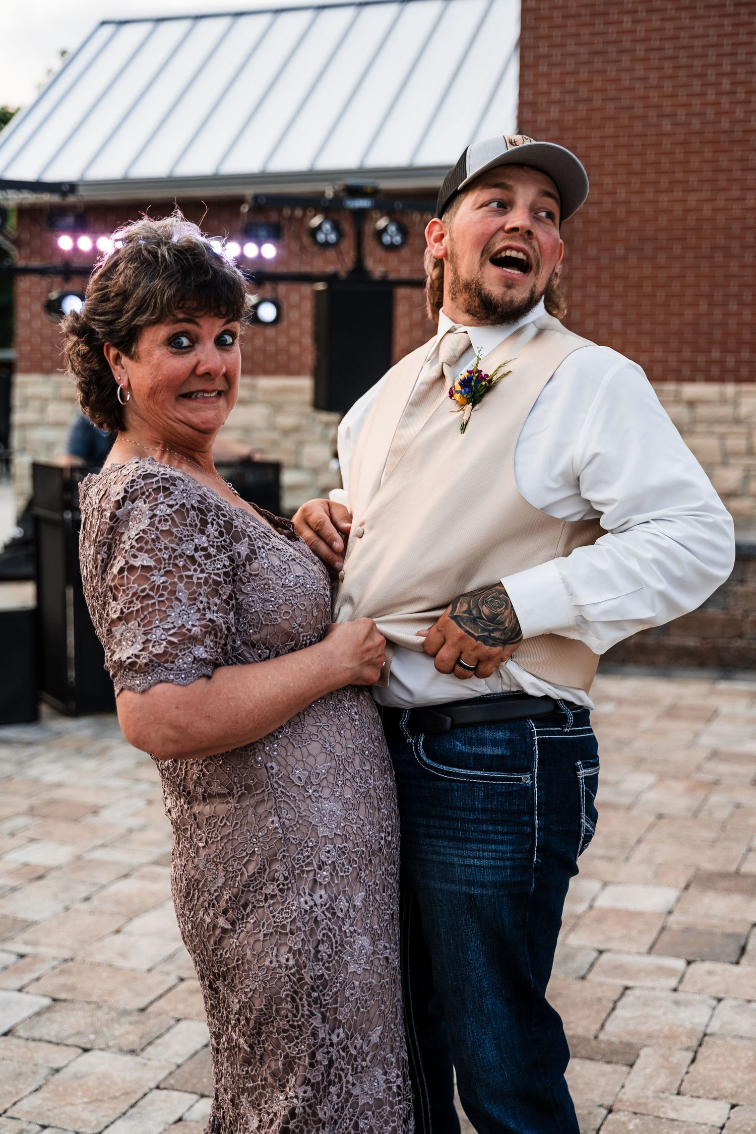 A candid sequence of dance moves between partners on a brick patio capturing joyful expressions and movement.