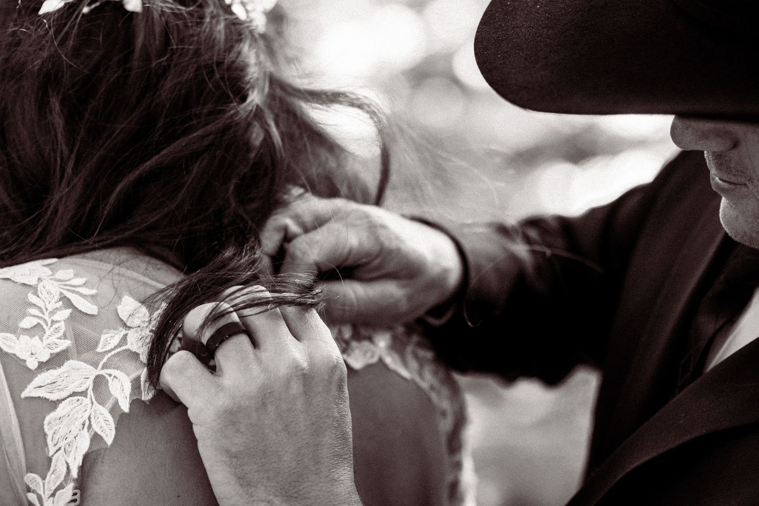 A series of black and white photographs showing intimate romantic moments between couples in shadow and silhouette.