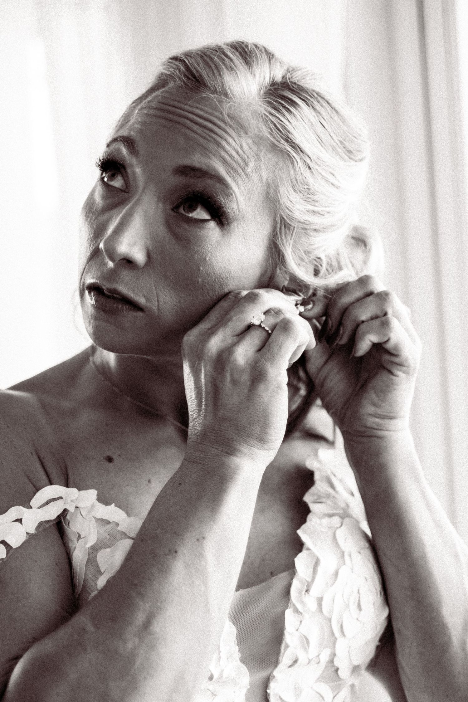 A series of black and white portraits showing playful facial expressions and emotions.