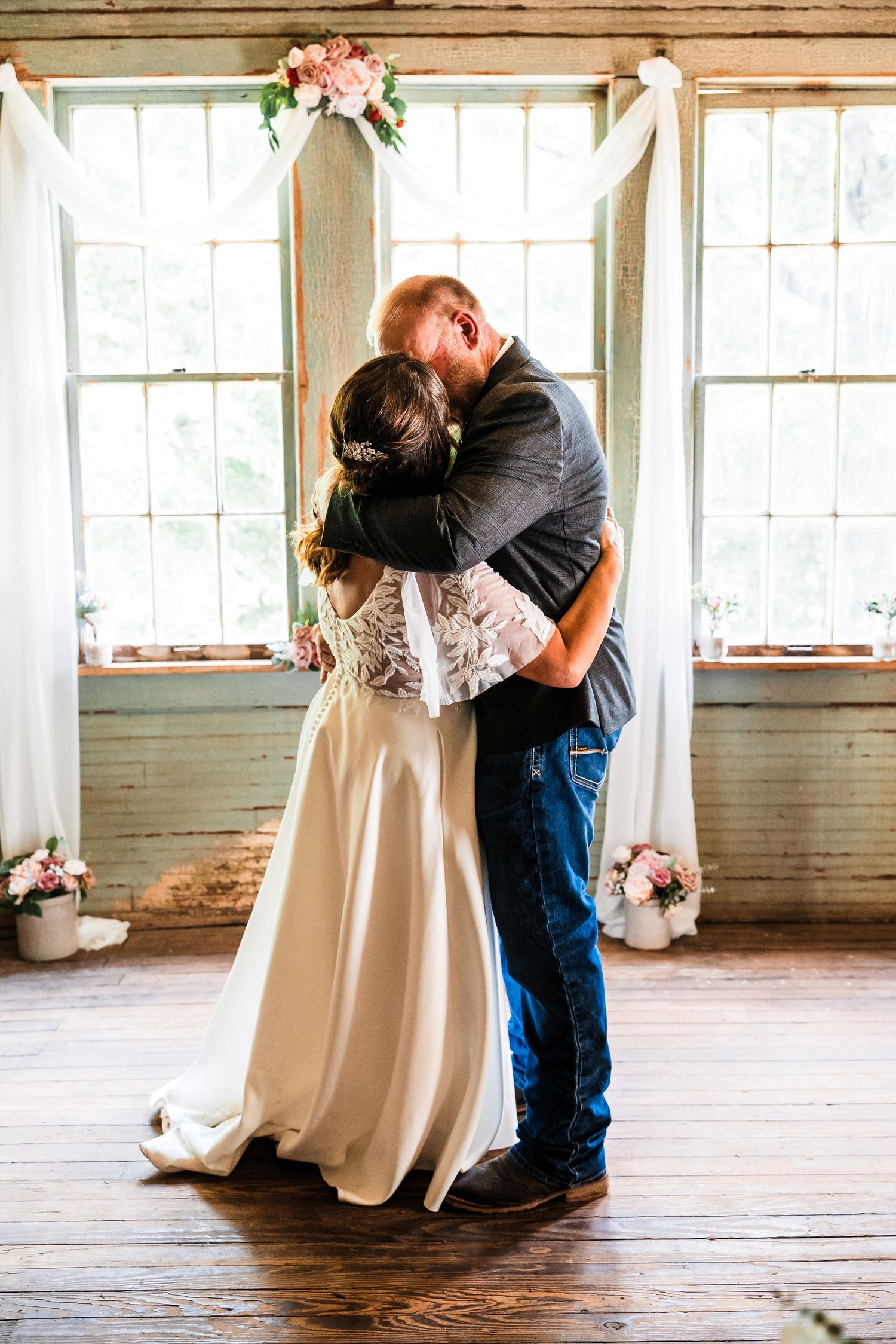 Emotional wedding moments captured in sequence at a sunlit indoor venue with wooden floors.