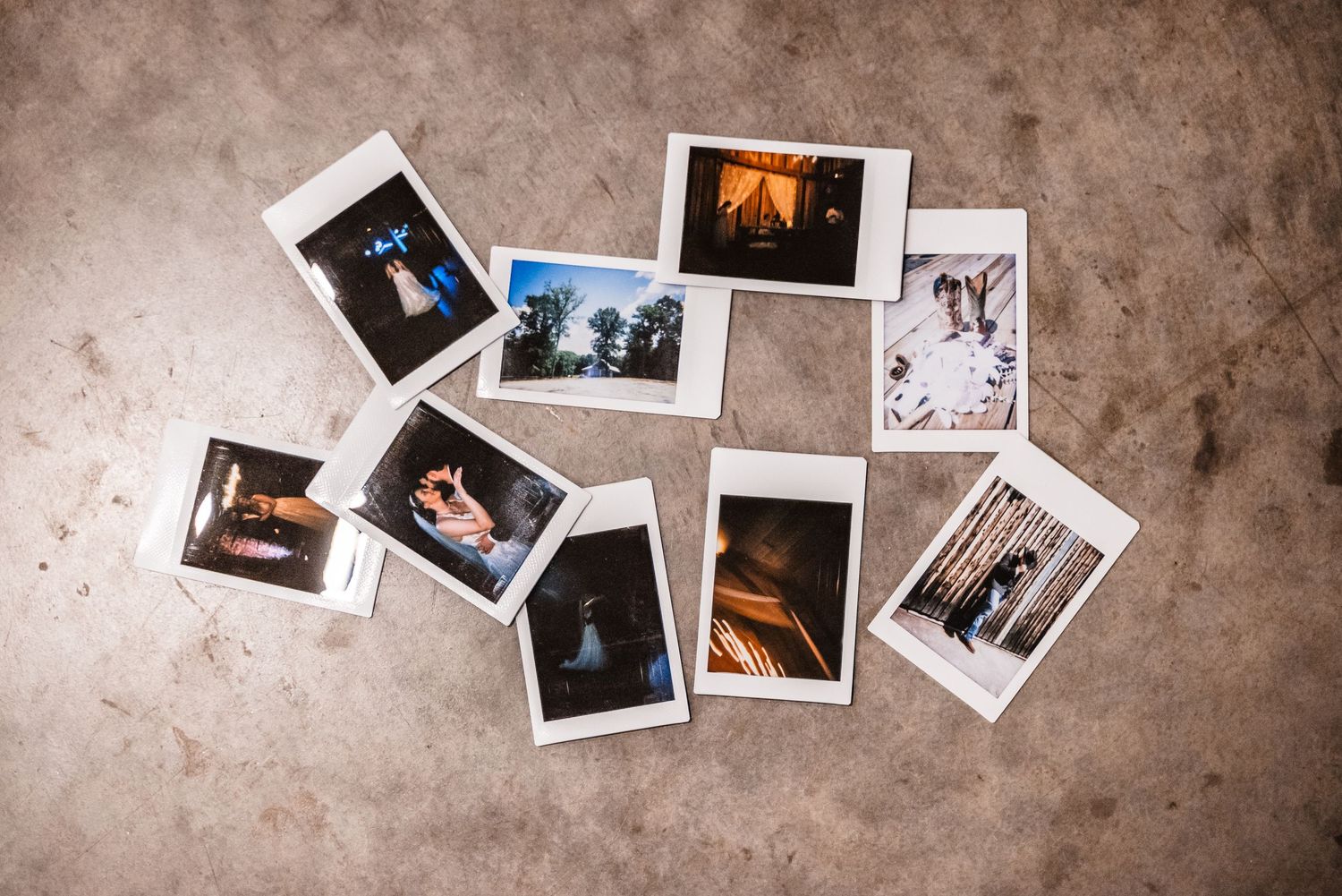A collection of vintage-style instant photos scattered on a textured brown surface showing various moments and memories.