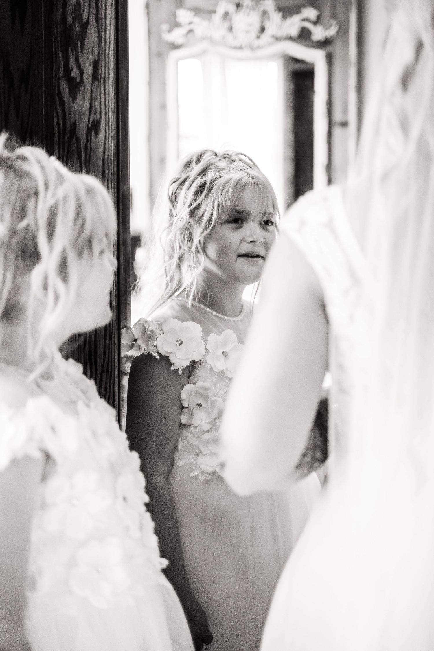 Montage of candid black and white portraits showing joyful expressions against a window background.