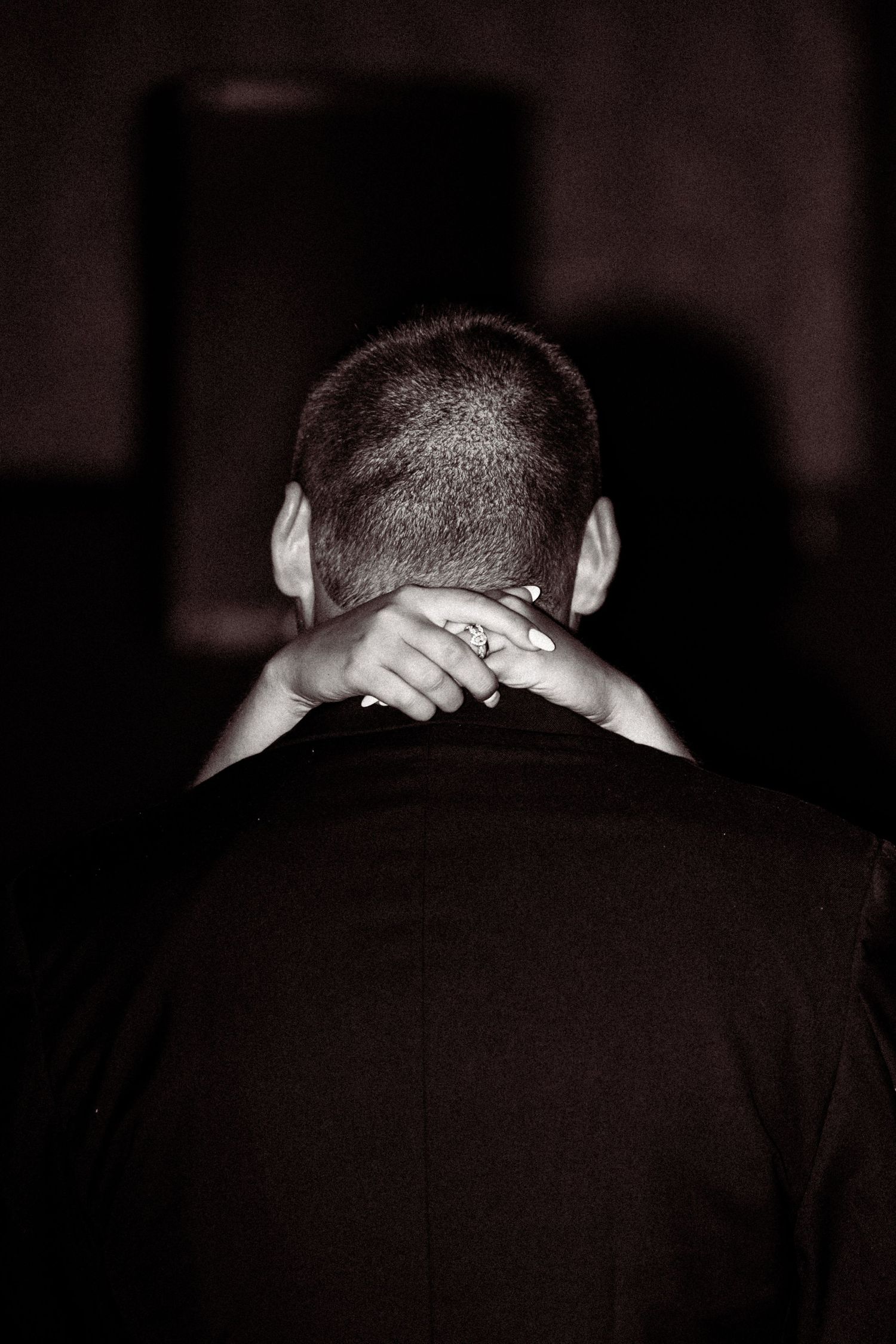 Dramatic black and white photo series showing back of head silhouettes.