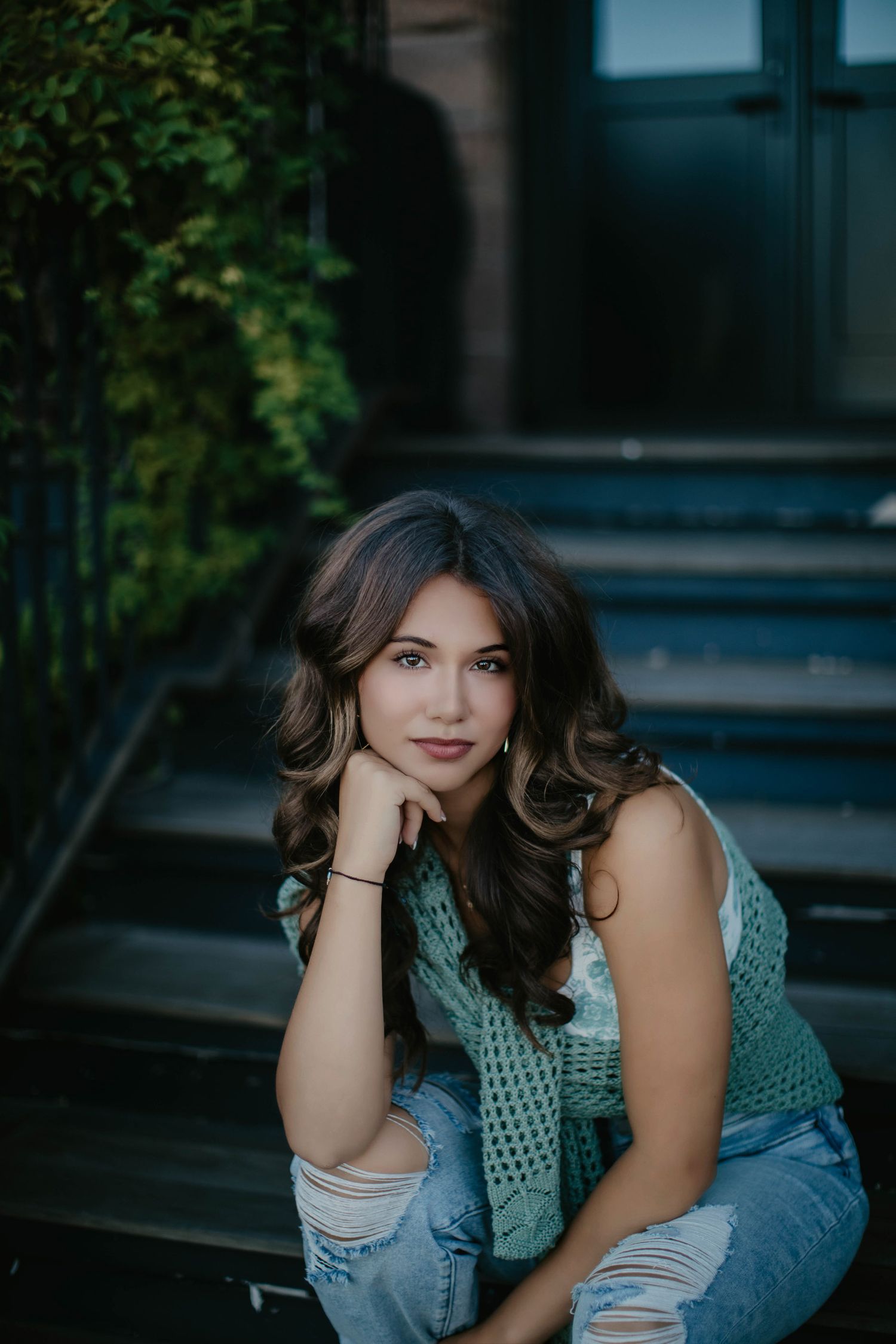 high school senior portraits girl sitting on stoop Marquette mi, Escanaba, NYC, Green Bay the best senior photographer