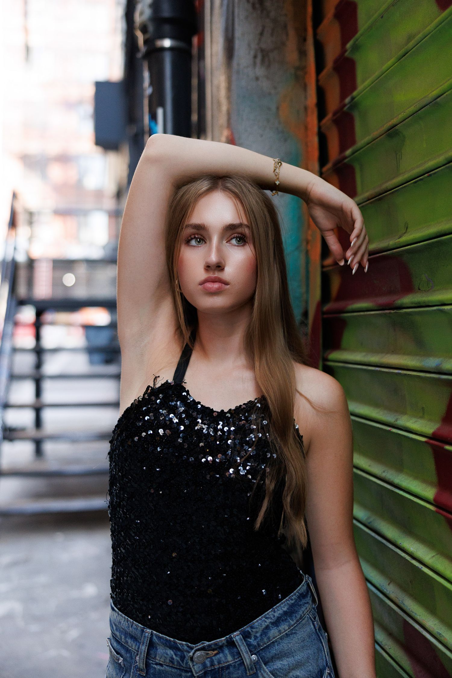 High School senior posing on an alley in the West Village in New York City.
