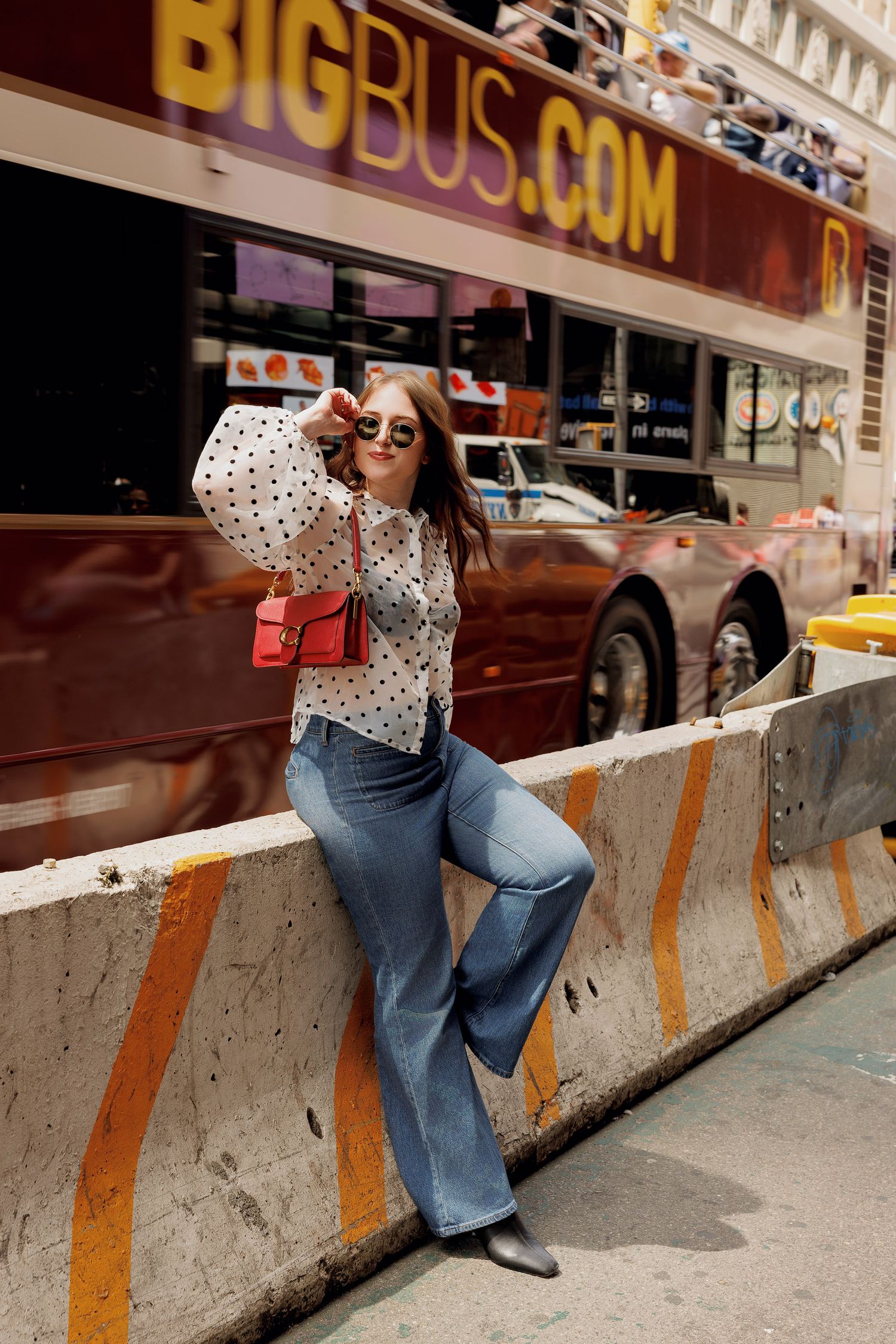 High school senior portraits in time square in NYC posing ideas for street shooting. NYC senior portrait photographer.  Marquette, Michigan,