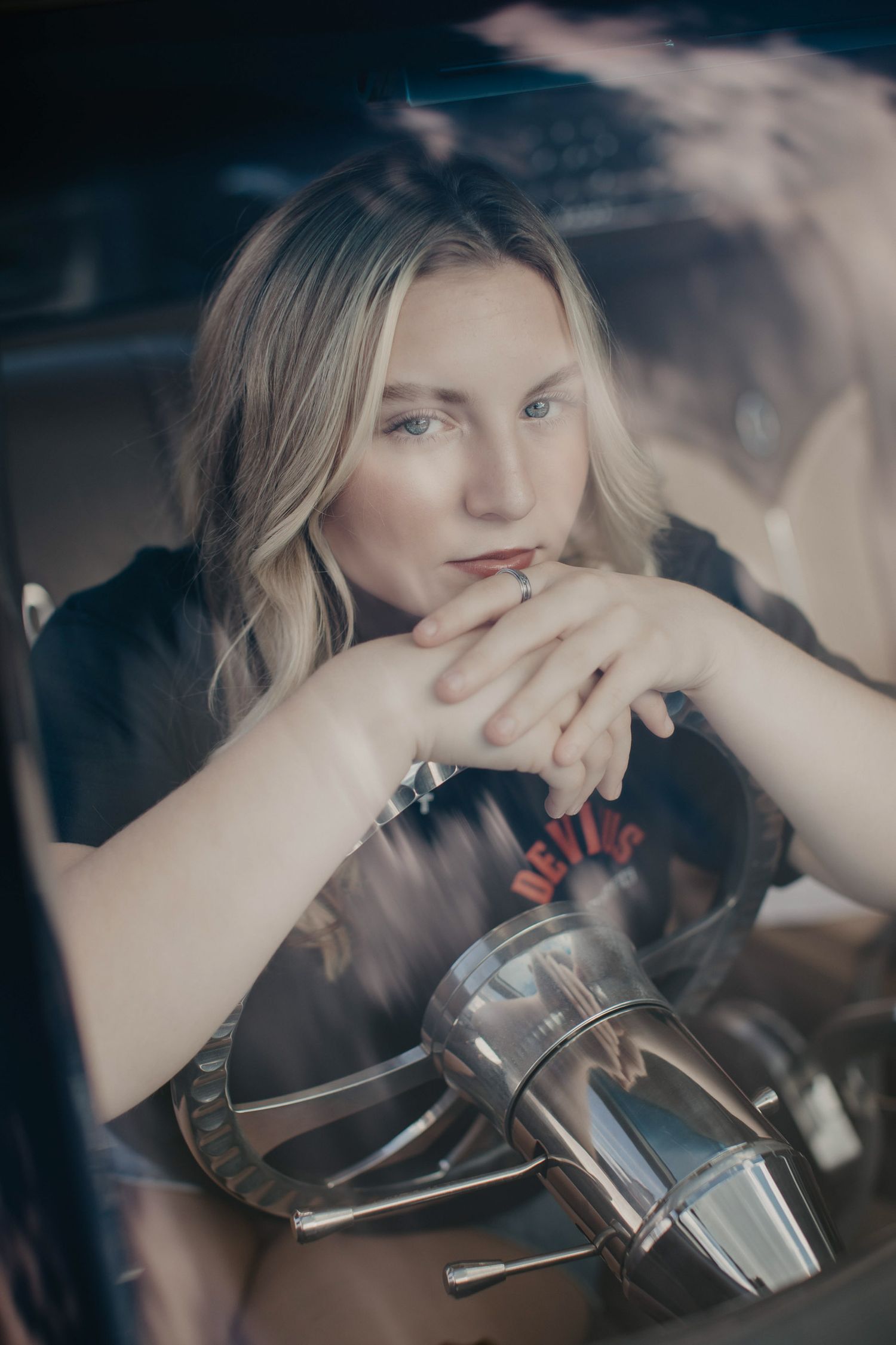 high school senior girl with her car. Escanaba, Marquette, NYC best senior portrait photographer