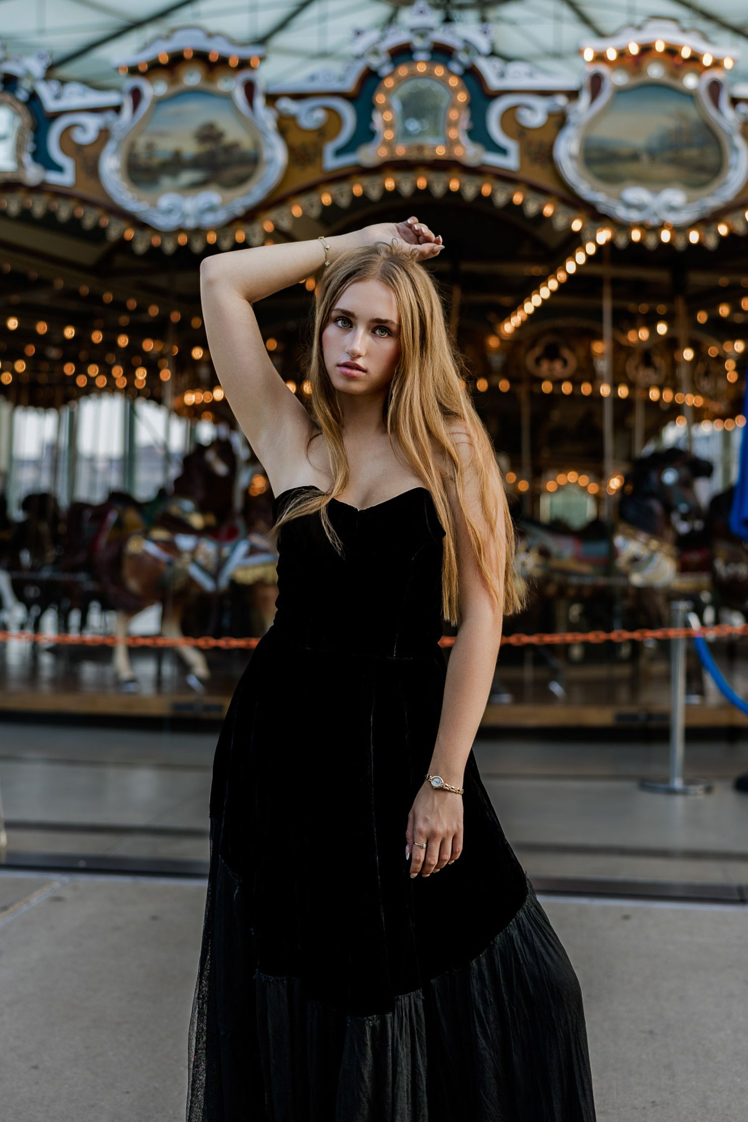 High School senior posing at the Dumbo carousel in Brooklyn, NY.