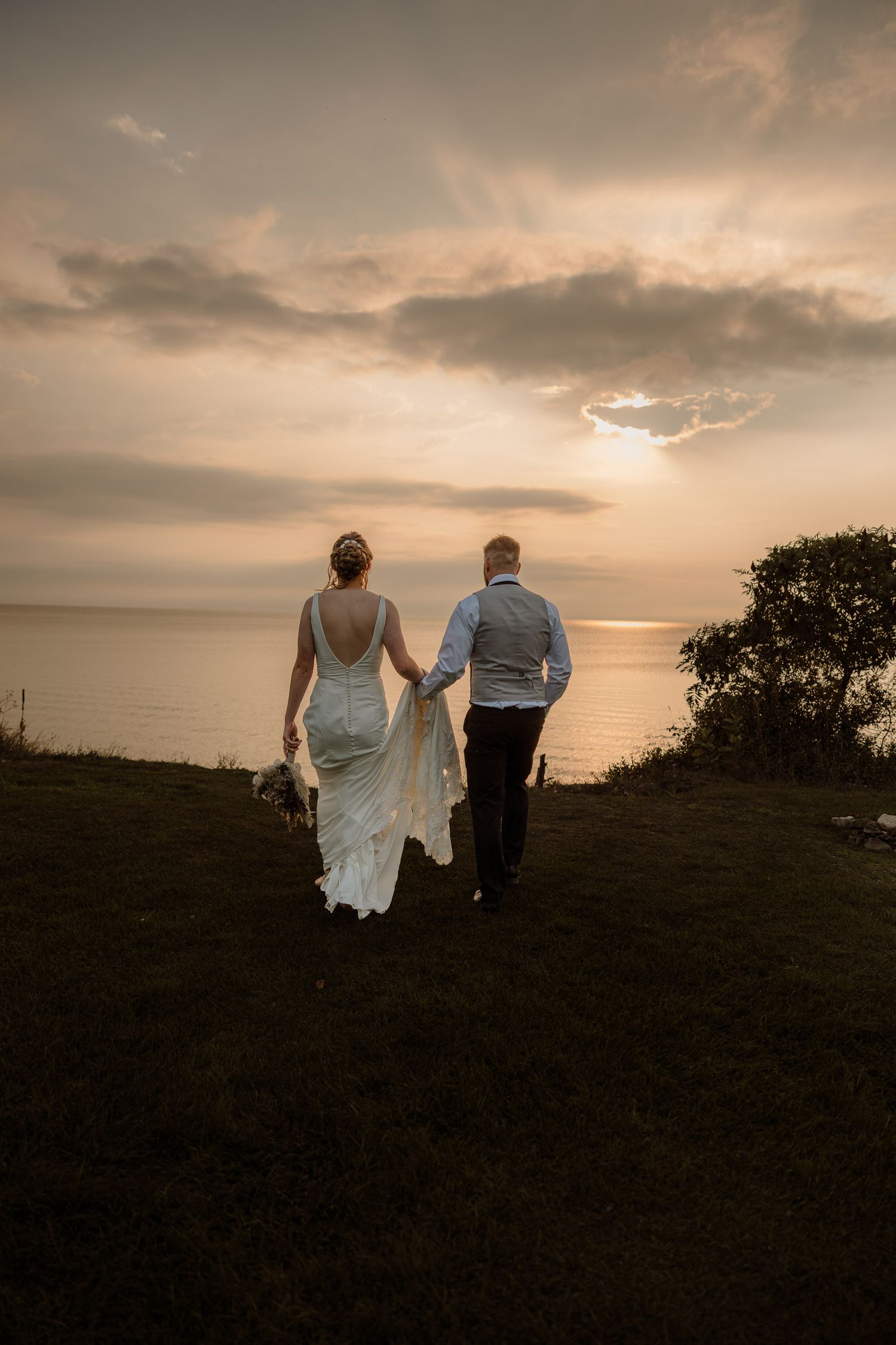 Intimate bride and groom cliffs, beach. wedding, engagement, elopement, destination the best photographer, upper peninsula, Fayette park