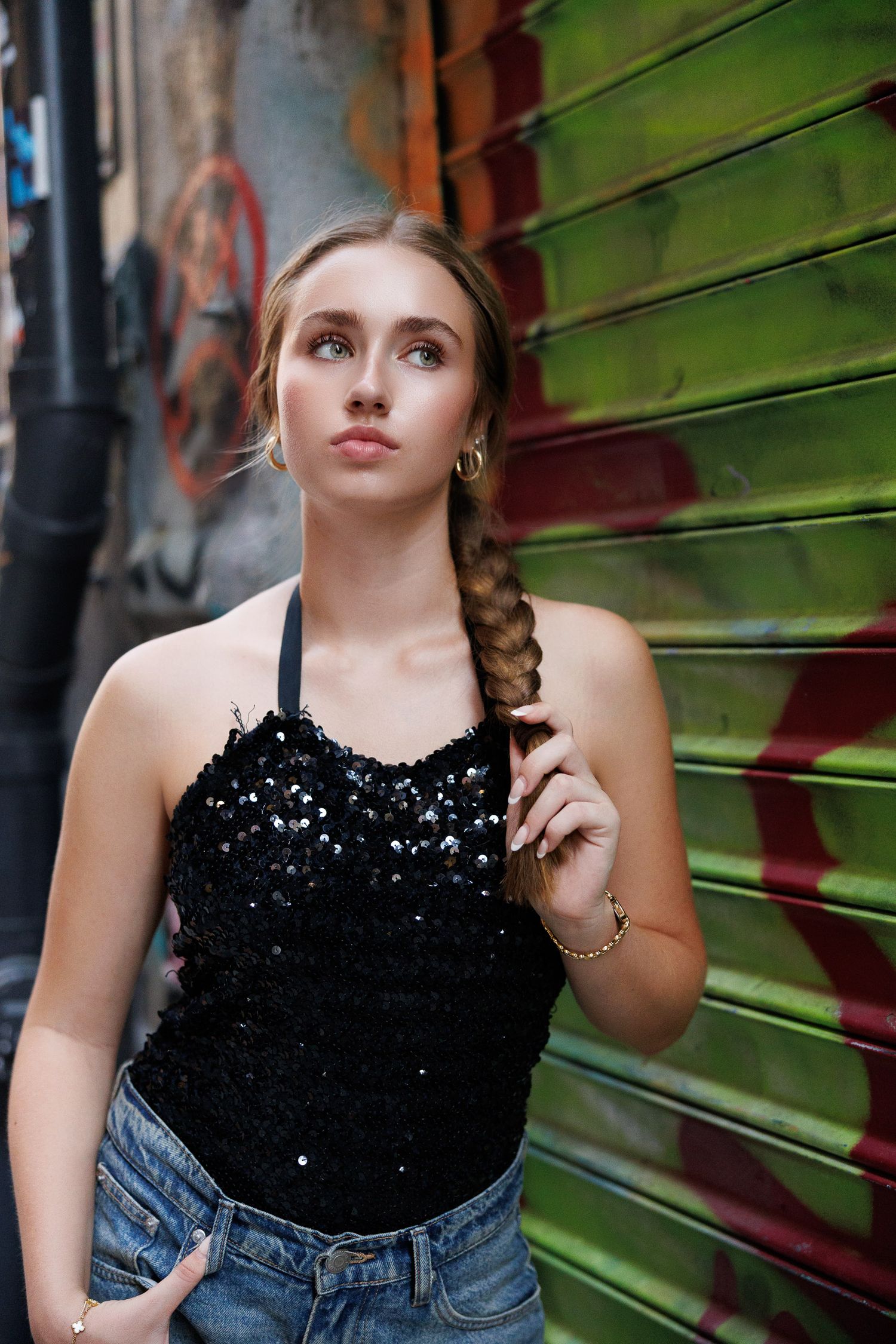 High School senior posing on an alley in the West Village in New York City.