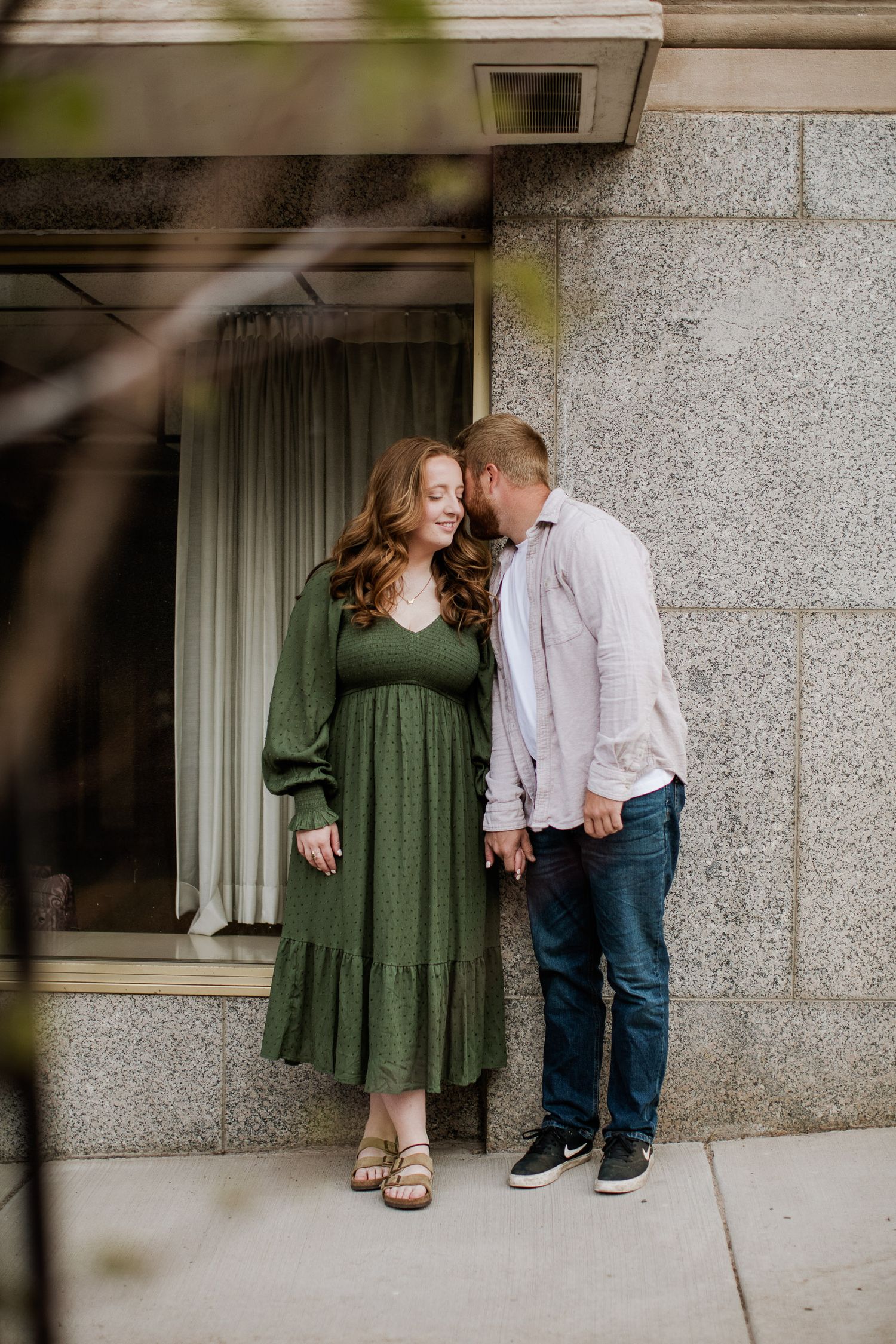 A couple downtown Marquette, Michigan for their sunrise engagement session.