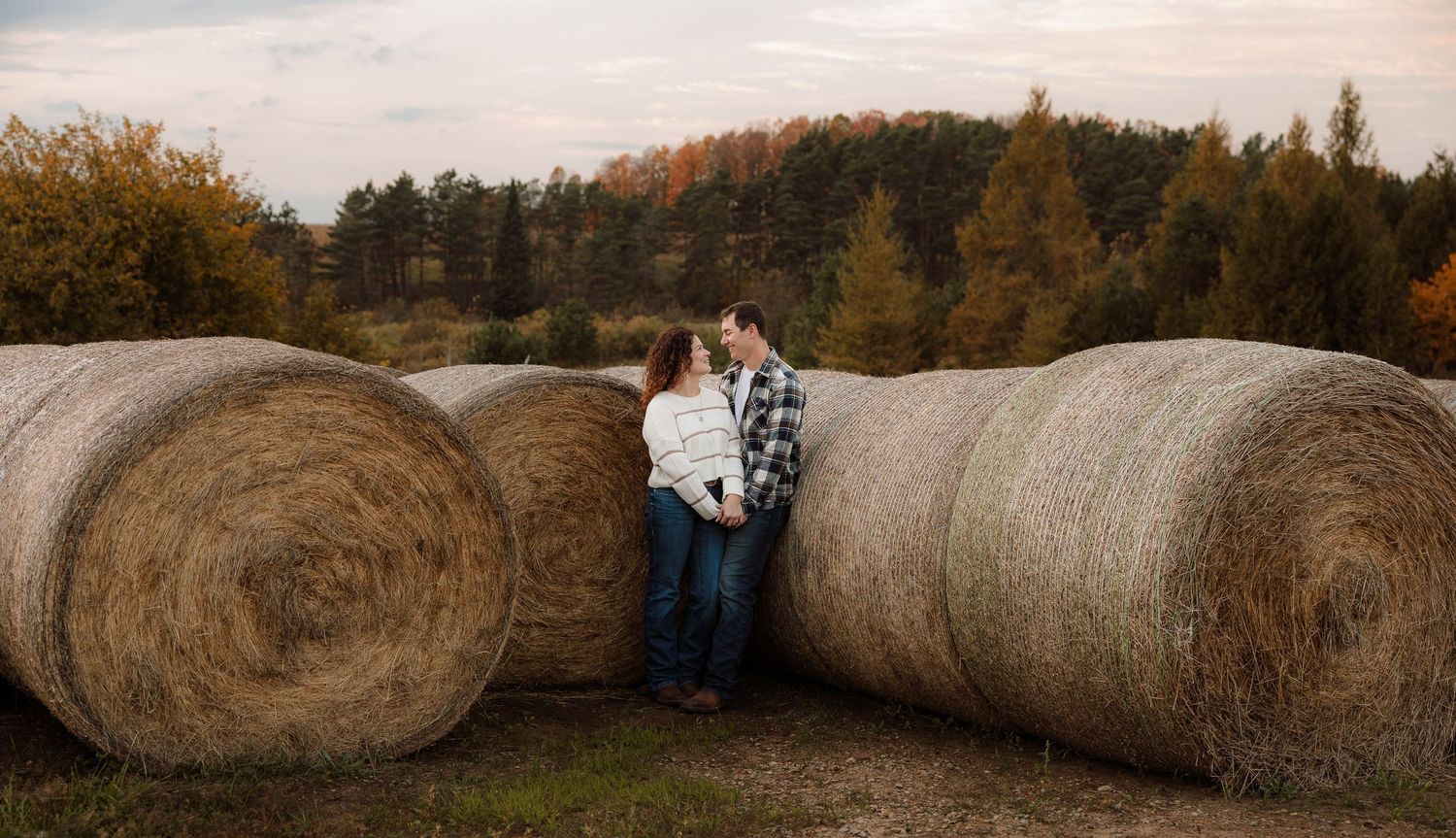 Intimate engagement shoot with hay bails in Escanaba, Michigan.