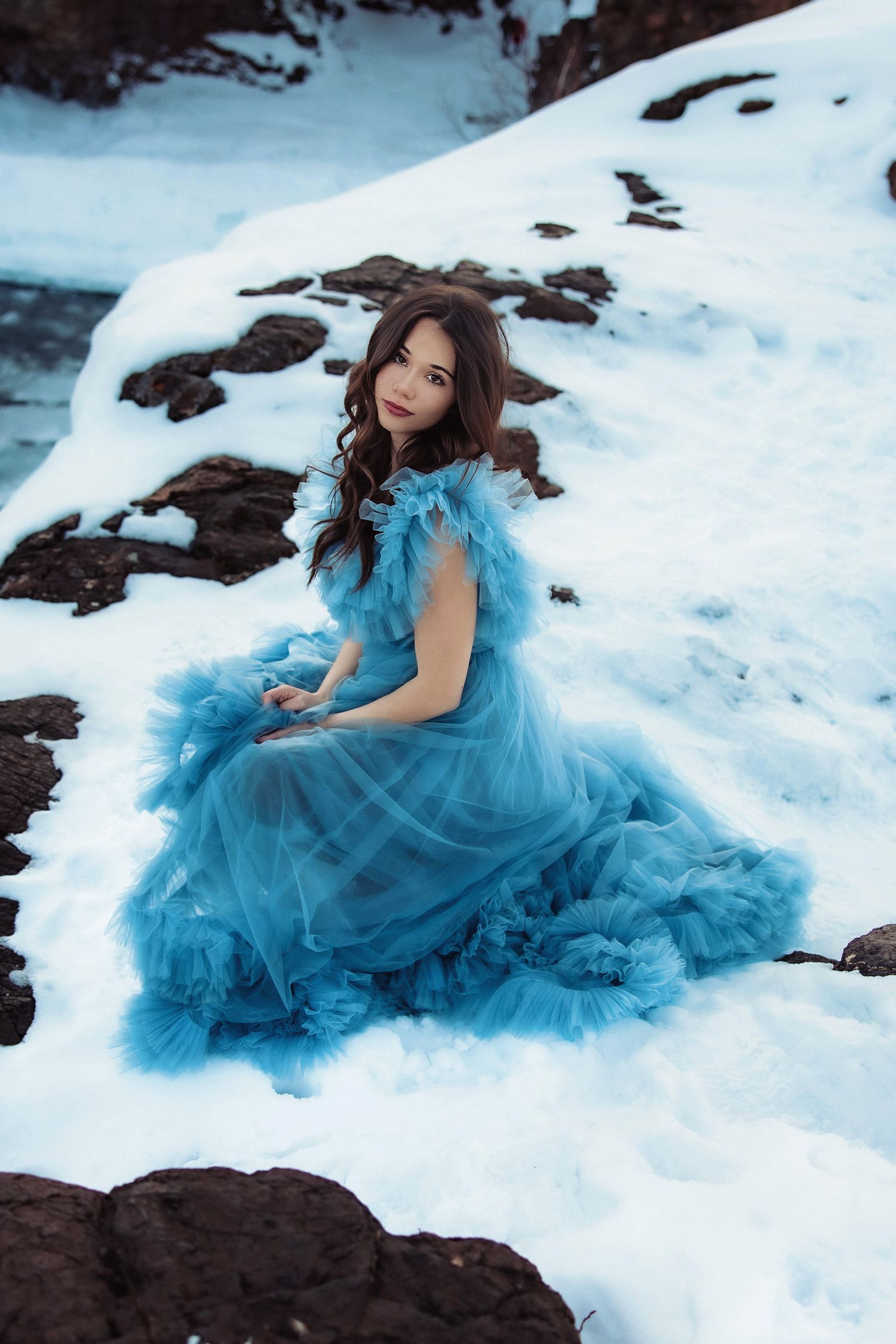 High school senior portrait in the winter at Black Rocks in Marquette, Michigan
