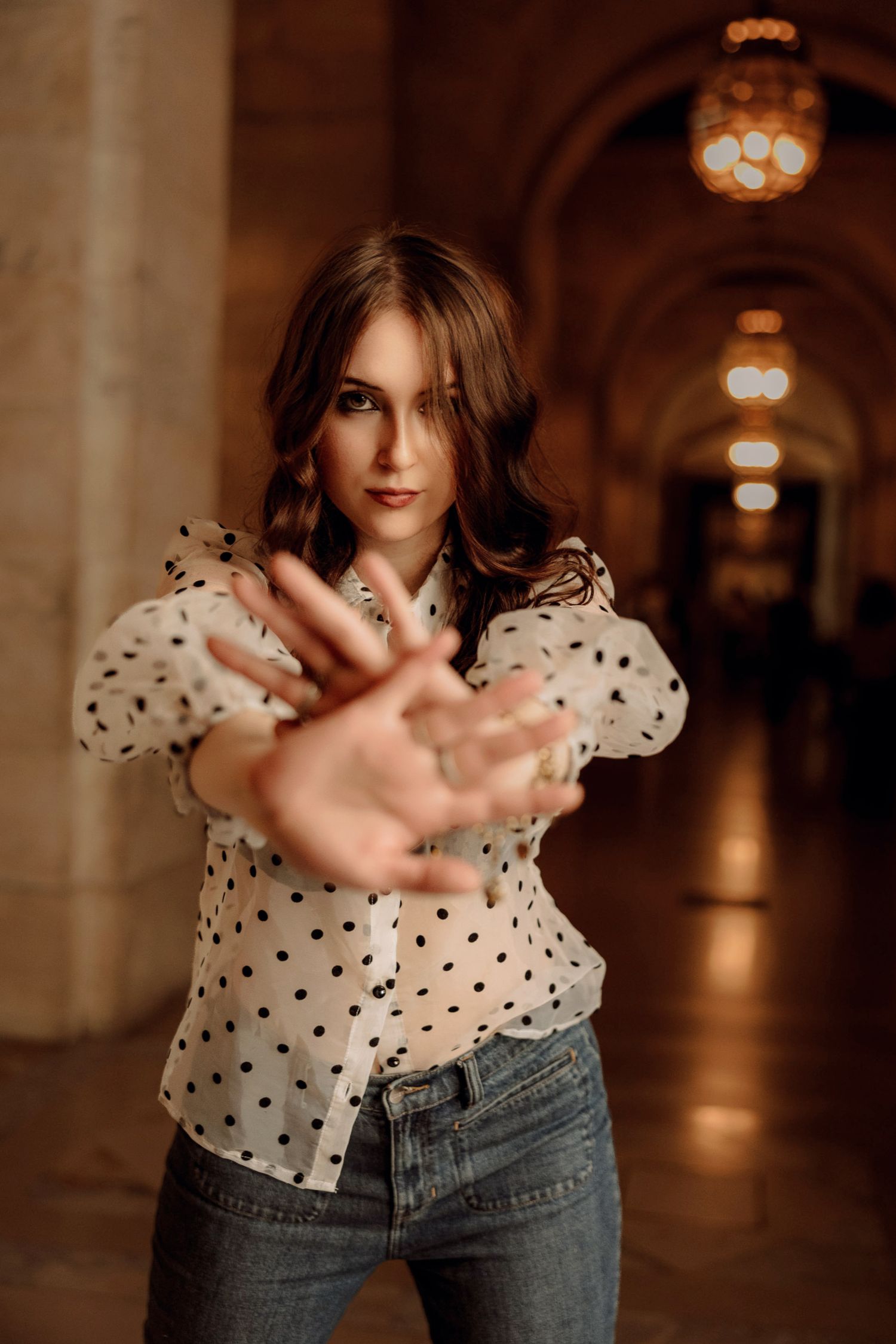 High School senior posing in the hallway at the public library in  New York City.