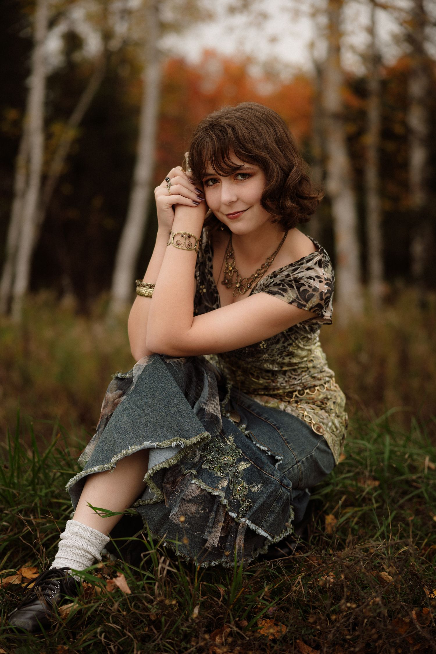 Senior portraits in golden hour field in Marquette, Michigan.