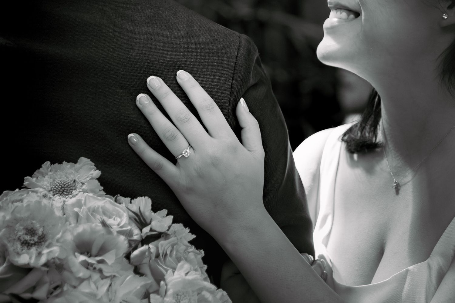 Black and white artistic portrait showing emotion and movement.