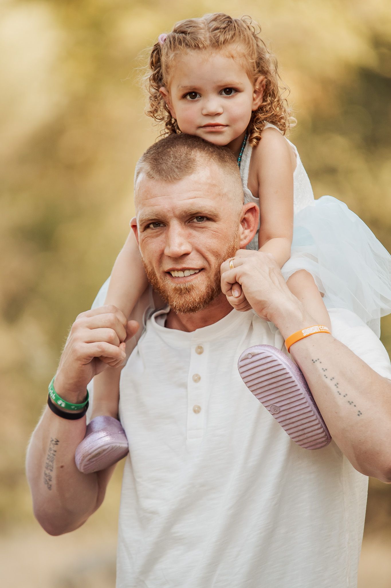 A series of candid outdoor portraits showing playful interaction between a child and adult in warm natural lighting.