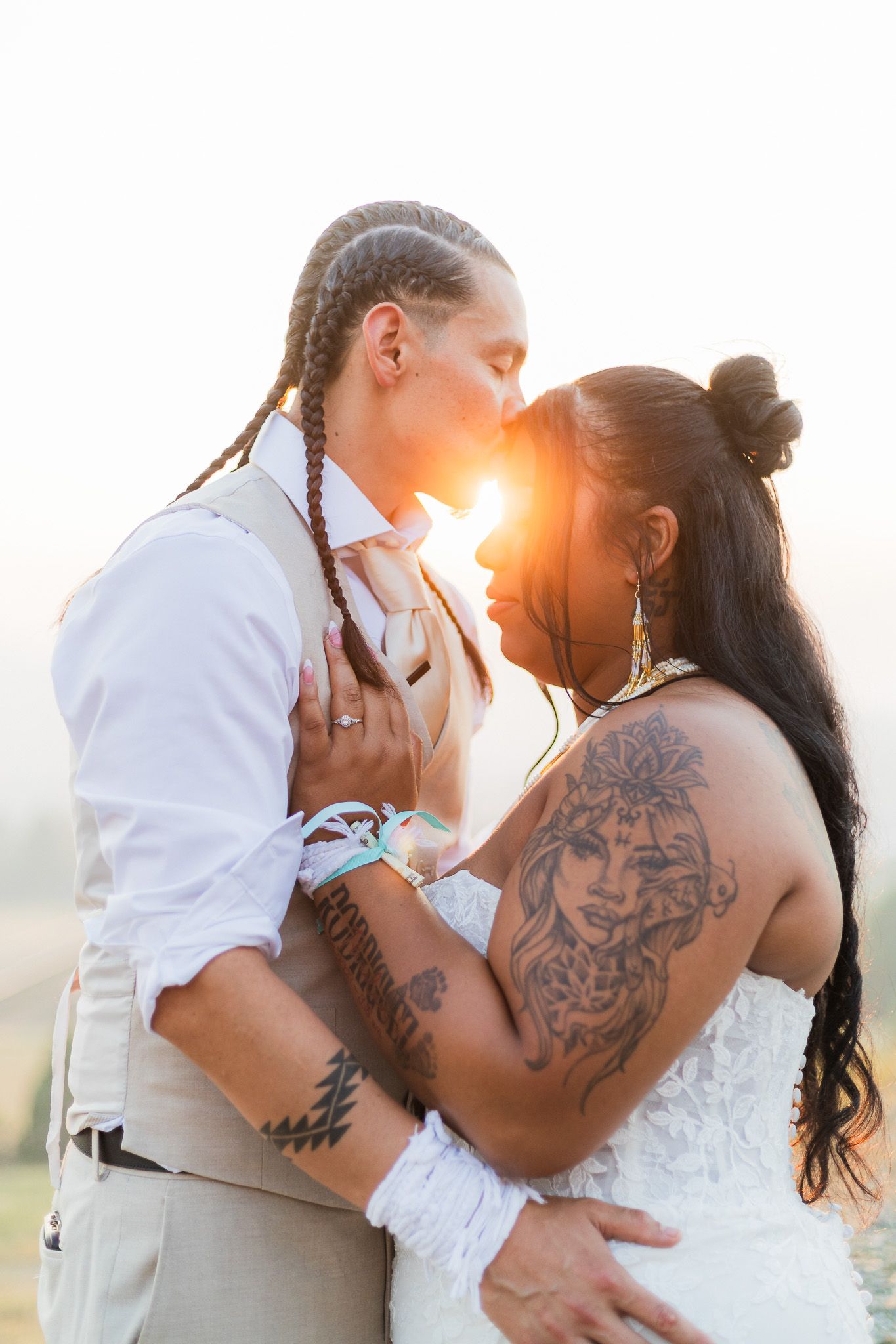 Romantic sunset photoshoot showing intimate moments between newlyweds.