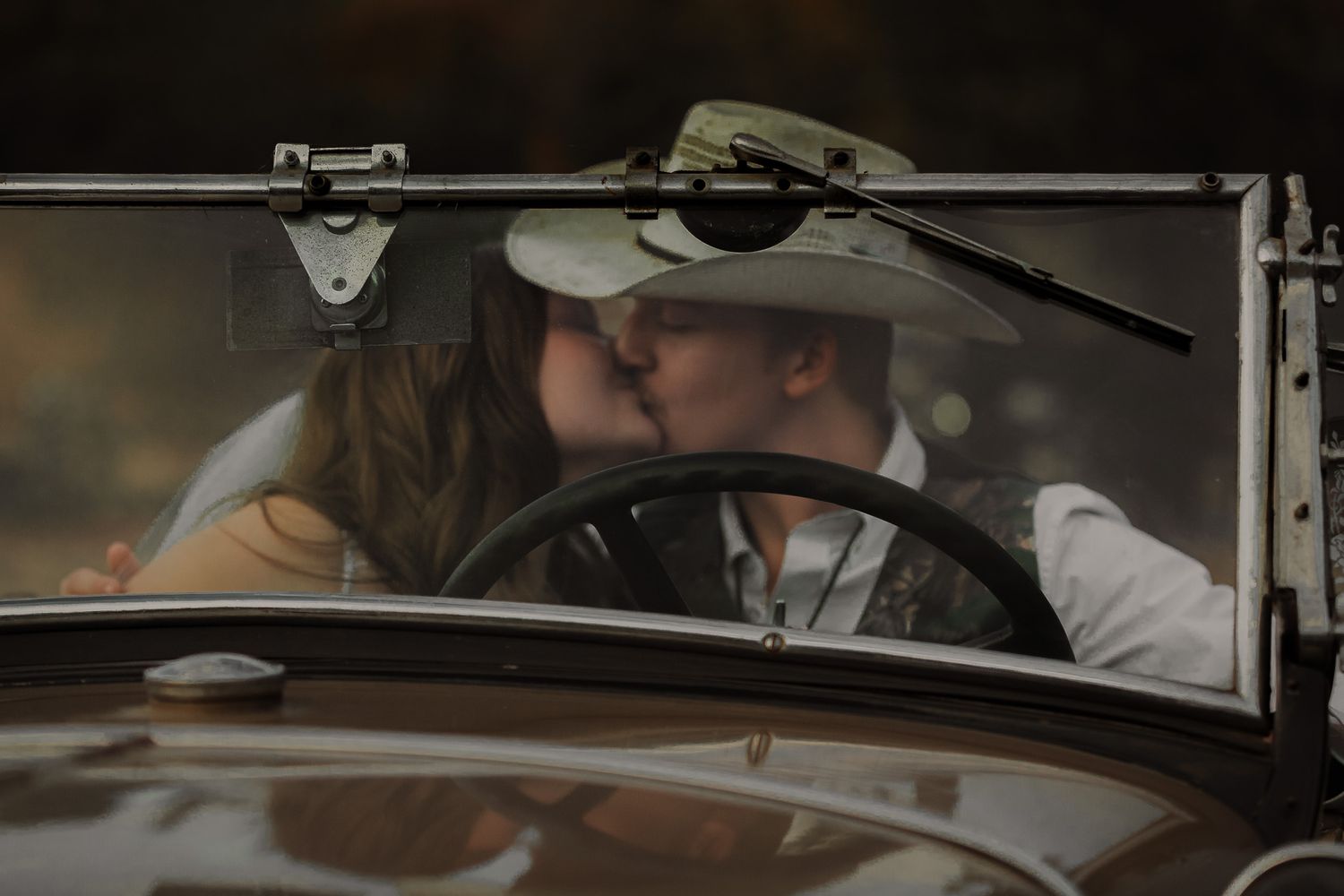 Vintage car detail shot at a rustic country wedding.