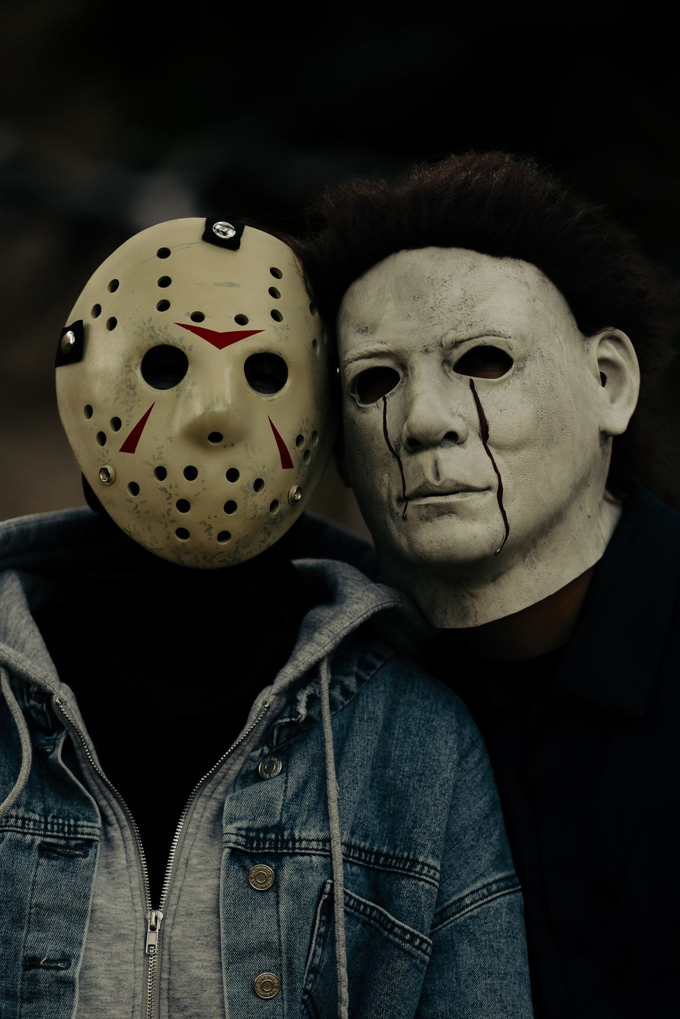 Dark artistic photos showing two horror movie masks - a hockey mask and Michael Myers mask in moody lighting.