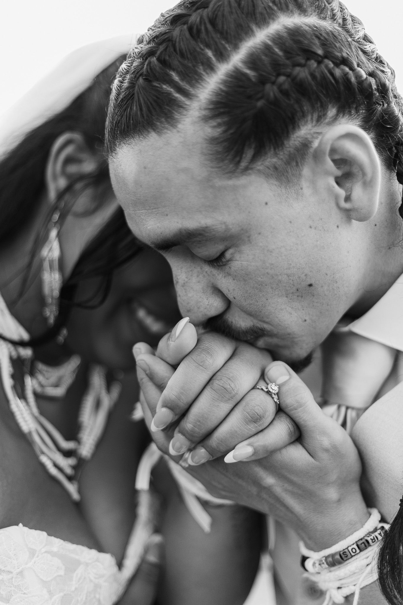 Black and white sequence showing emotional reactions during wedding ceremony.