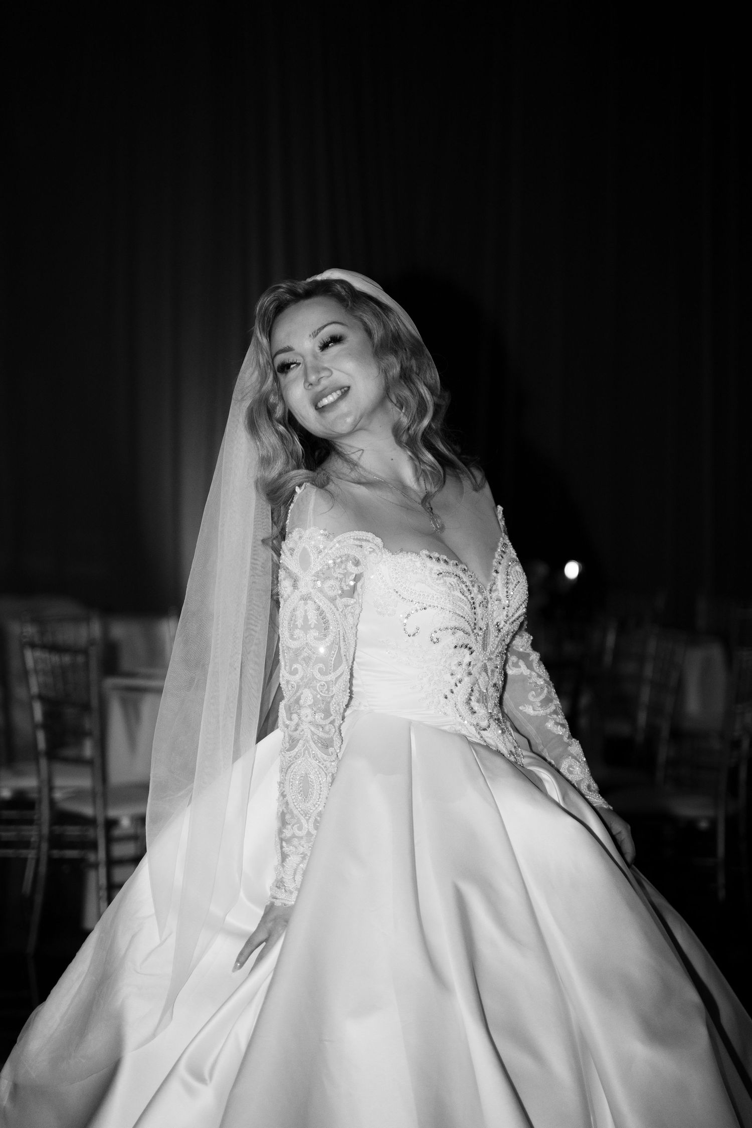 Artistic black and white photos showing the movement and flow of a wedding dress.