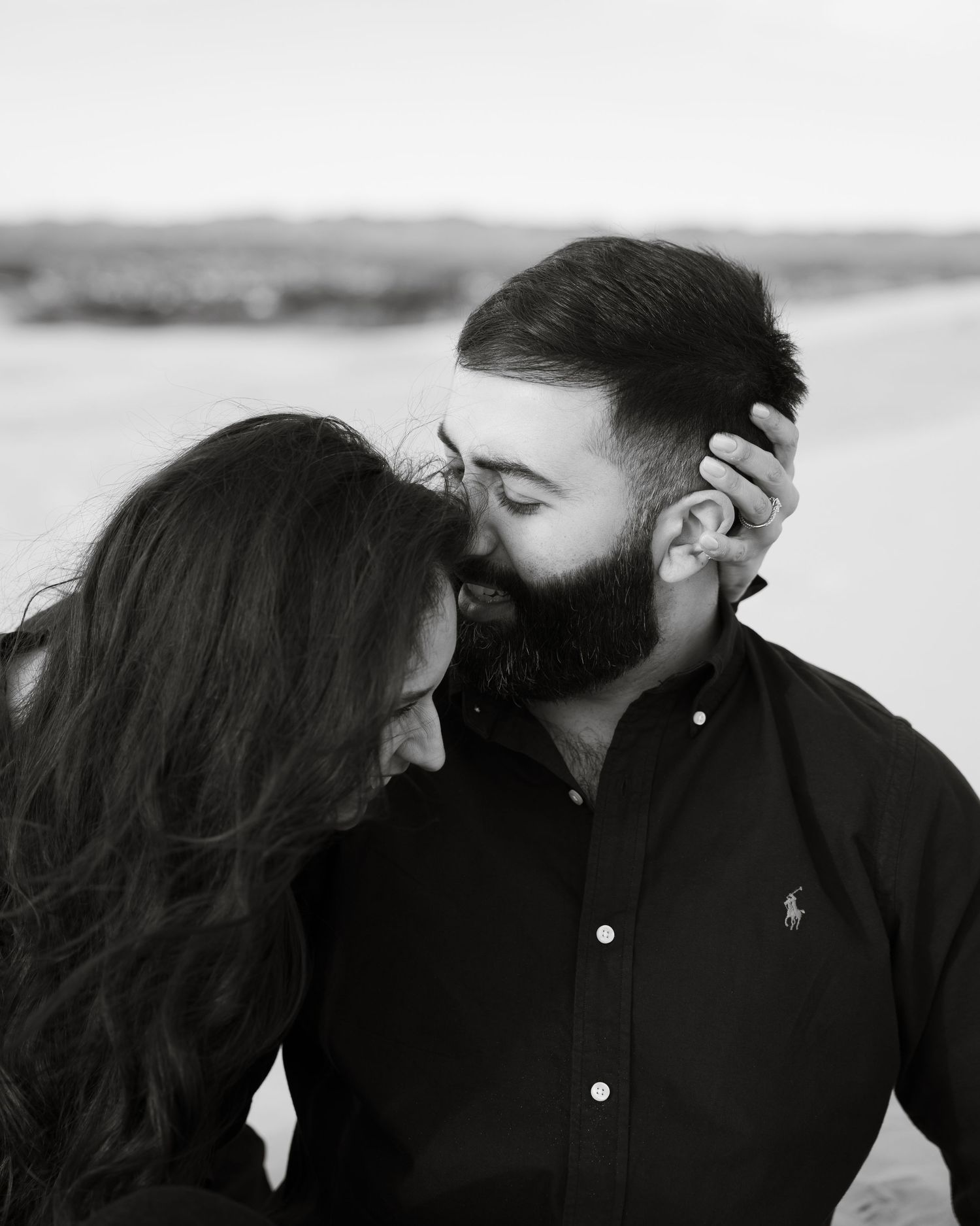 Black and white intimate portrait series showing tender moments between a couple.