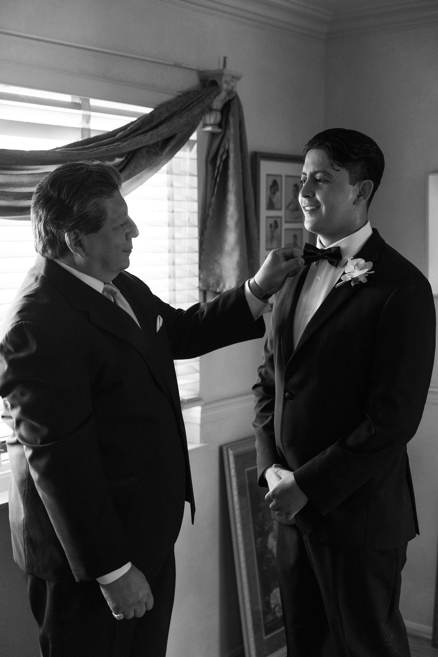 Black and white candid shots of wedding party members getting ready.